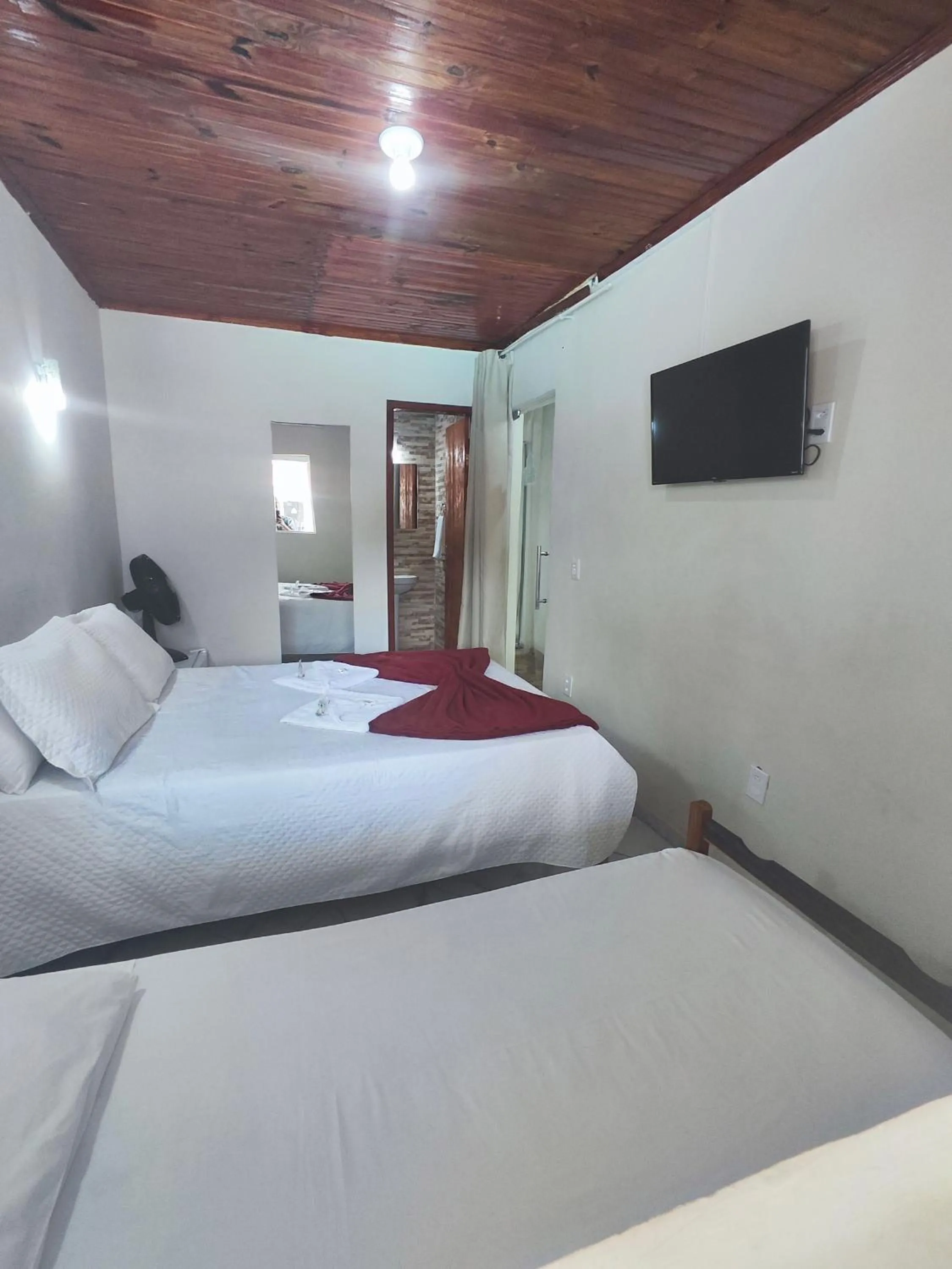 Bed in Pousada Sinhá Moça
