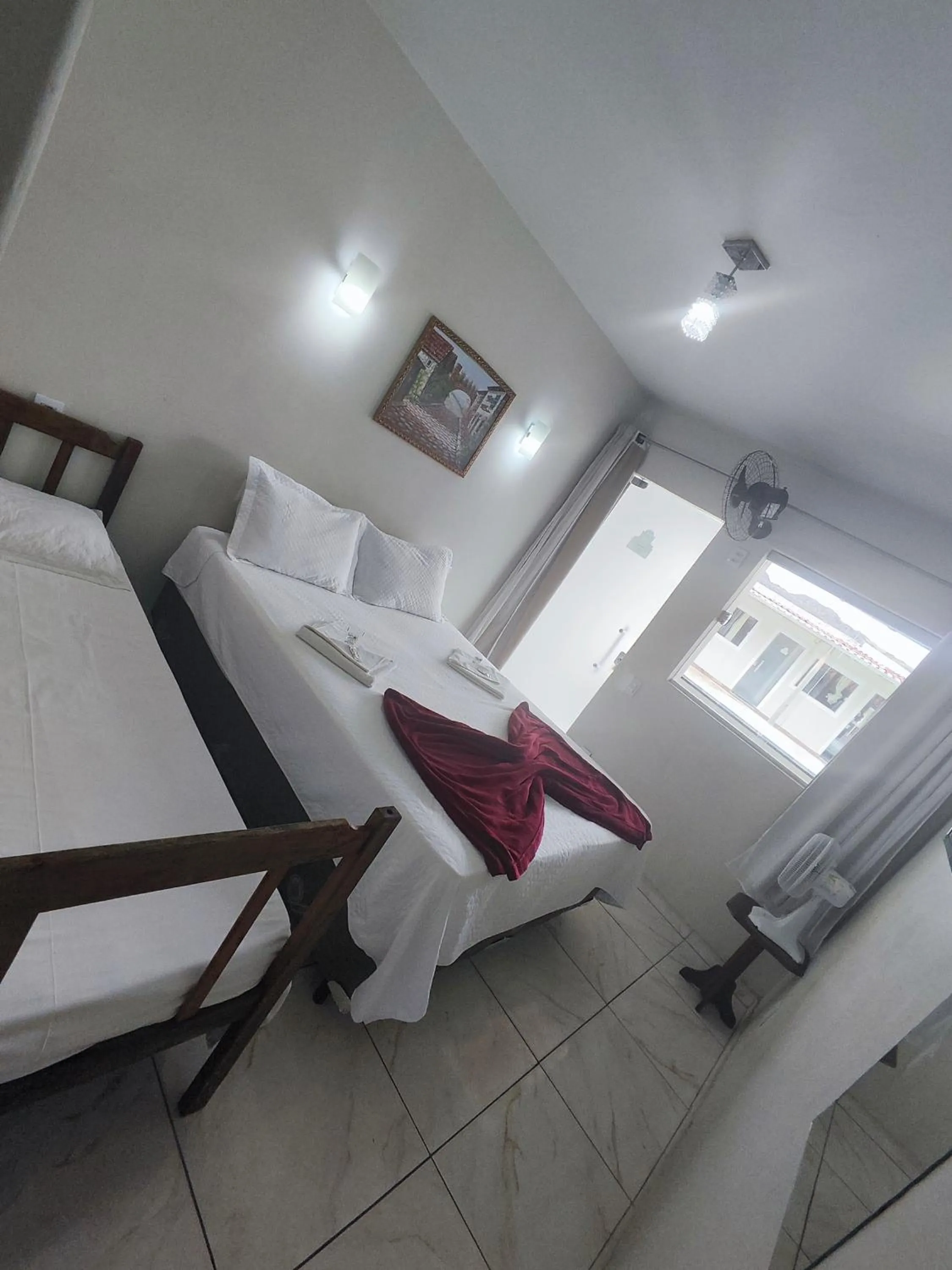Bed in Pousada Sinhá Moça