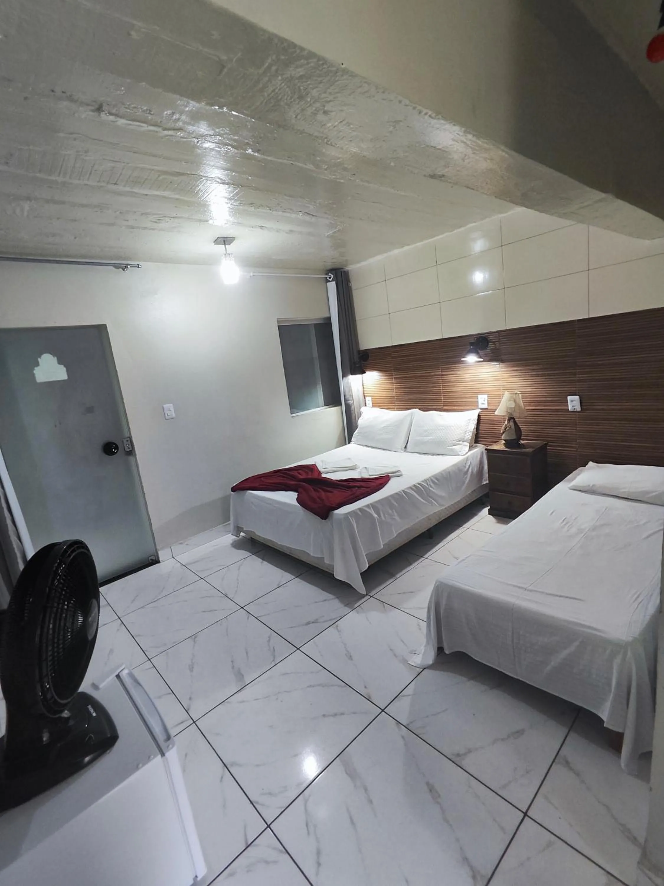 Bed in Pousada Sinhá Moça