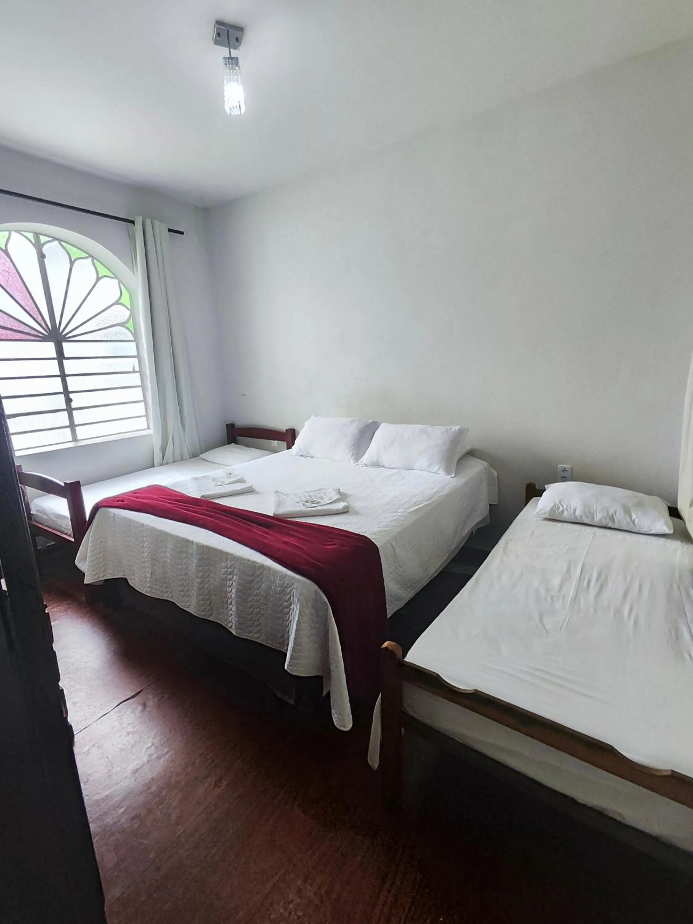 Bed in Pousada Sinhá Moça