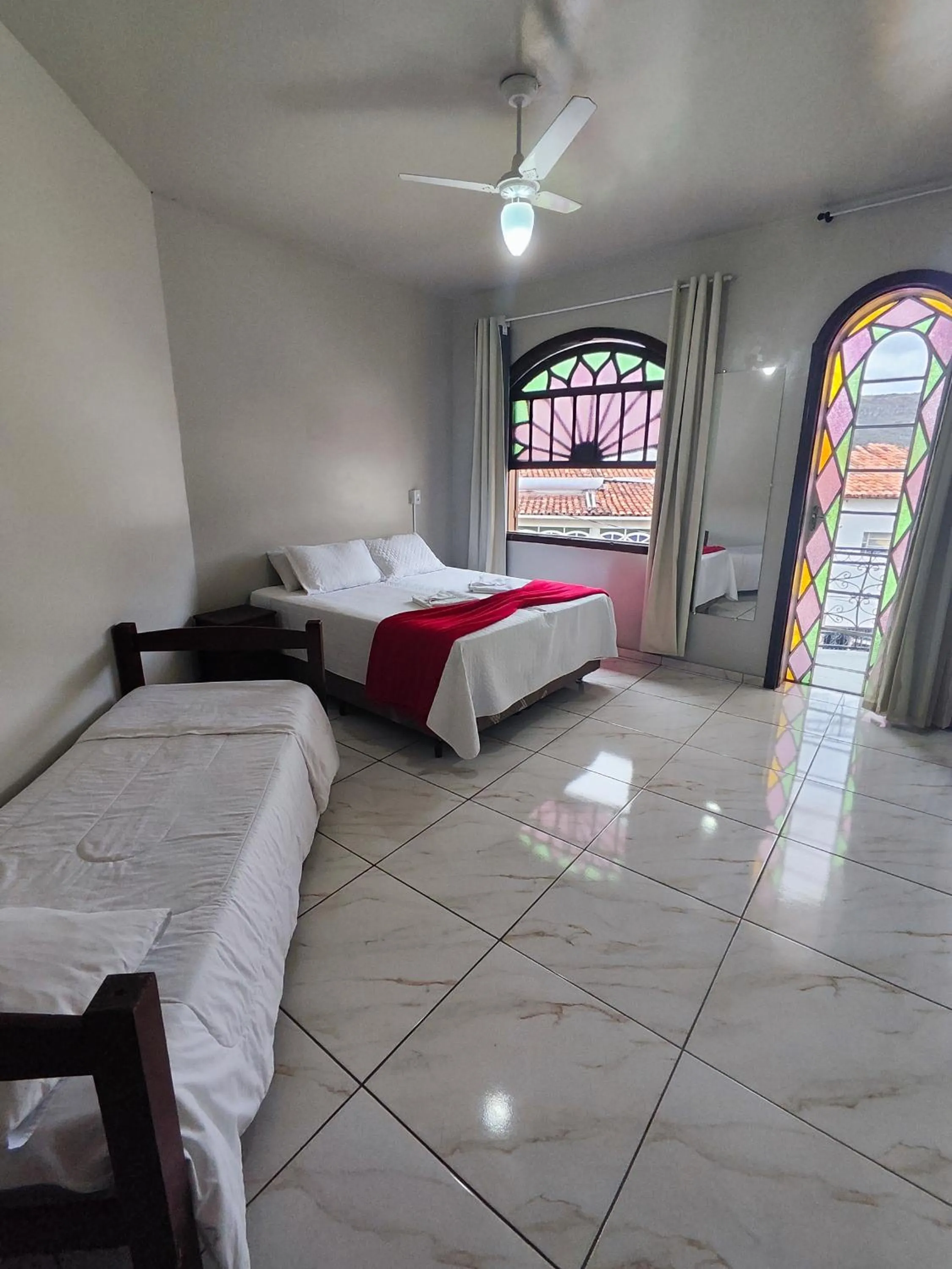 Bed in Pousada Sinhá Moça