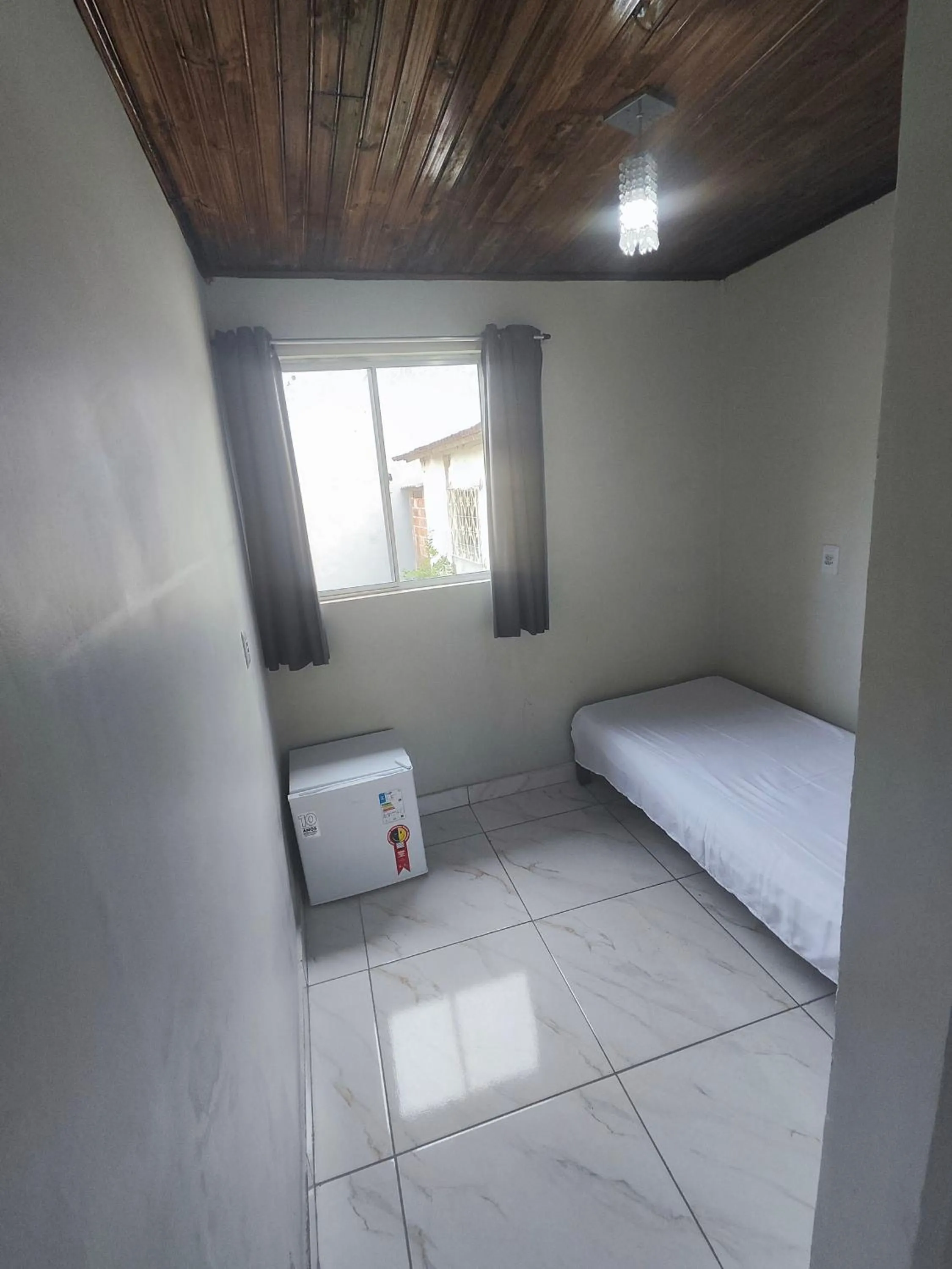 Bed in Pousada Sinhá Moça