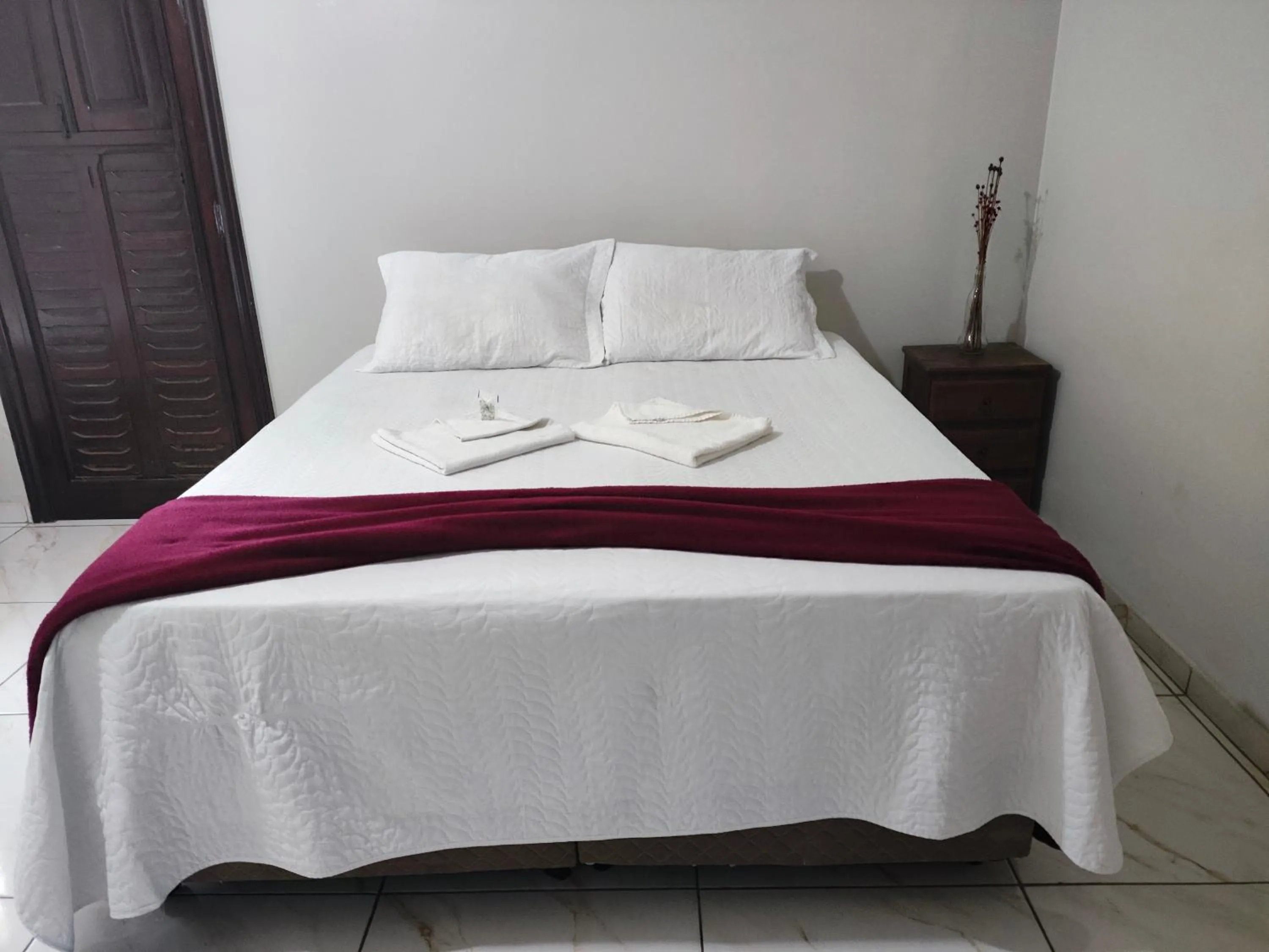 Bed in Pousada Sinhá Moça