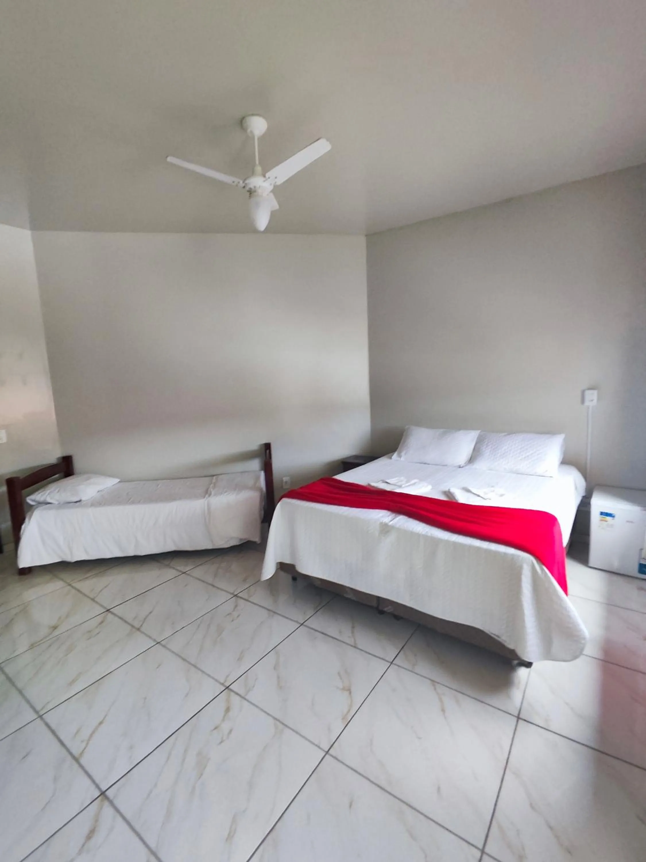 Bed in Pousada Sinhá Moça