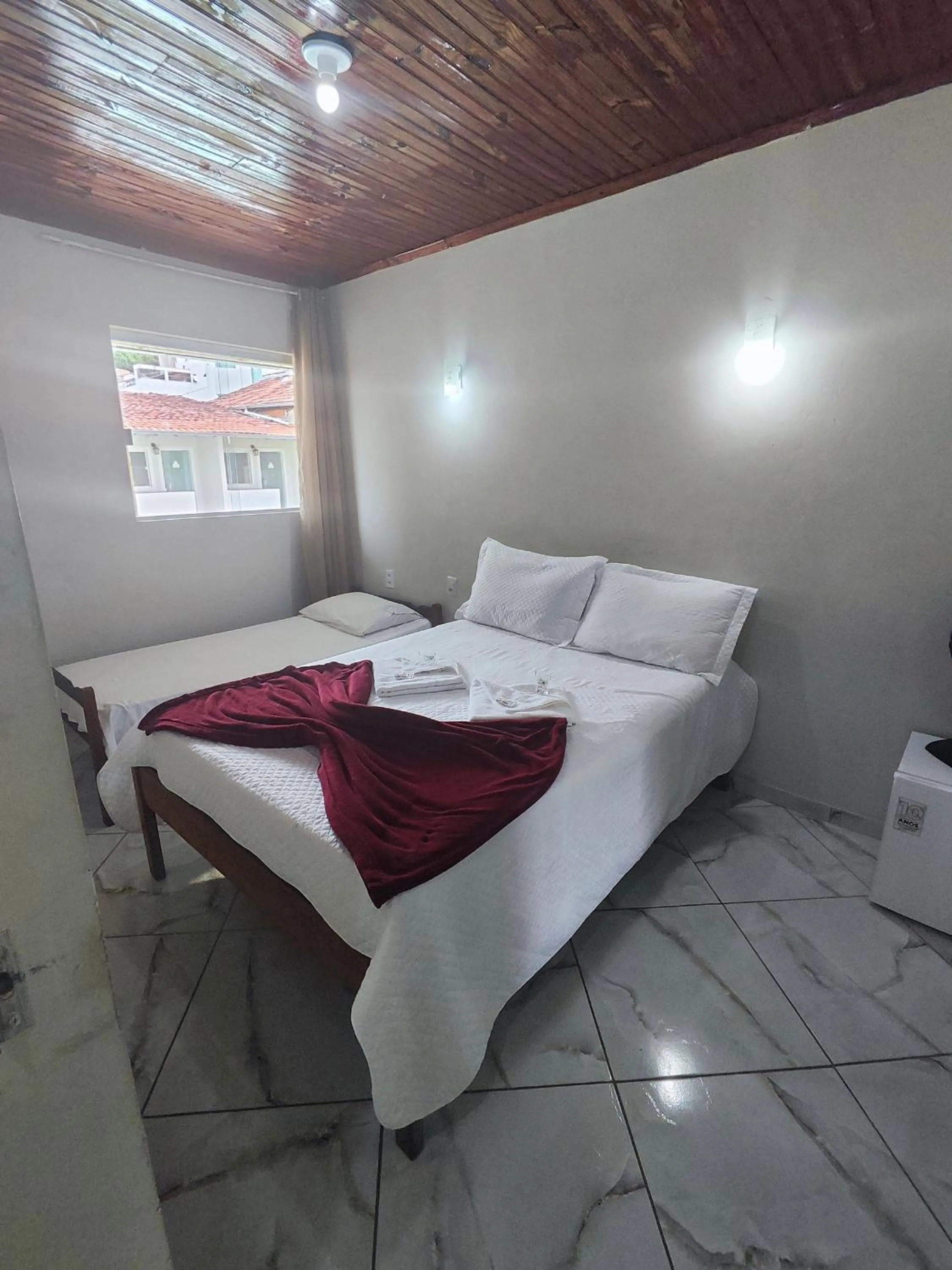 Bed in Pousada Sinhá Moça
