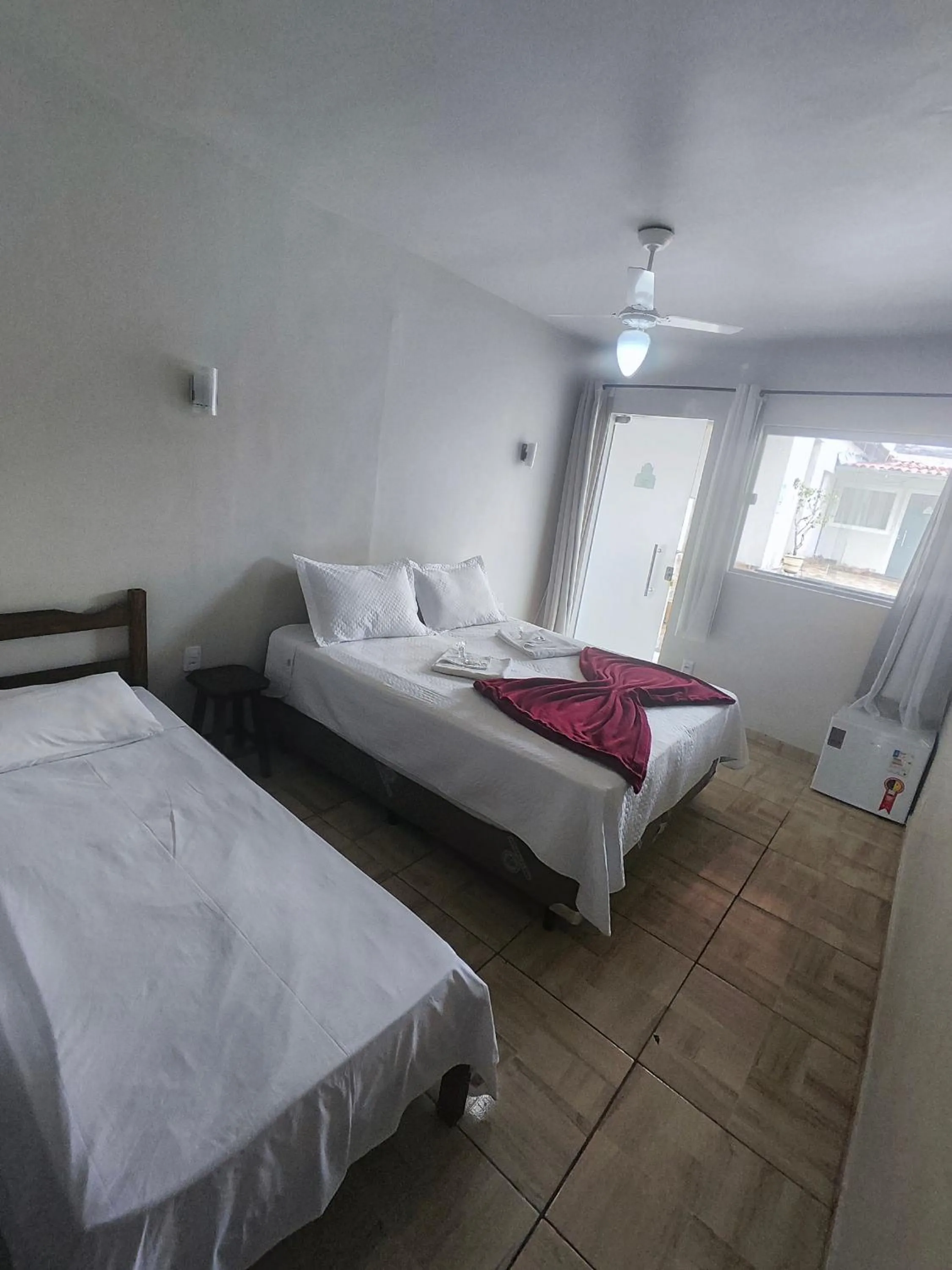 Bed in Pousada Sinhá Moça
