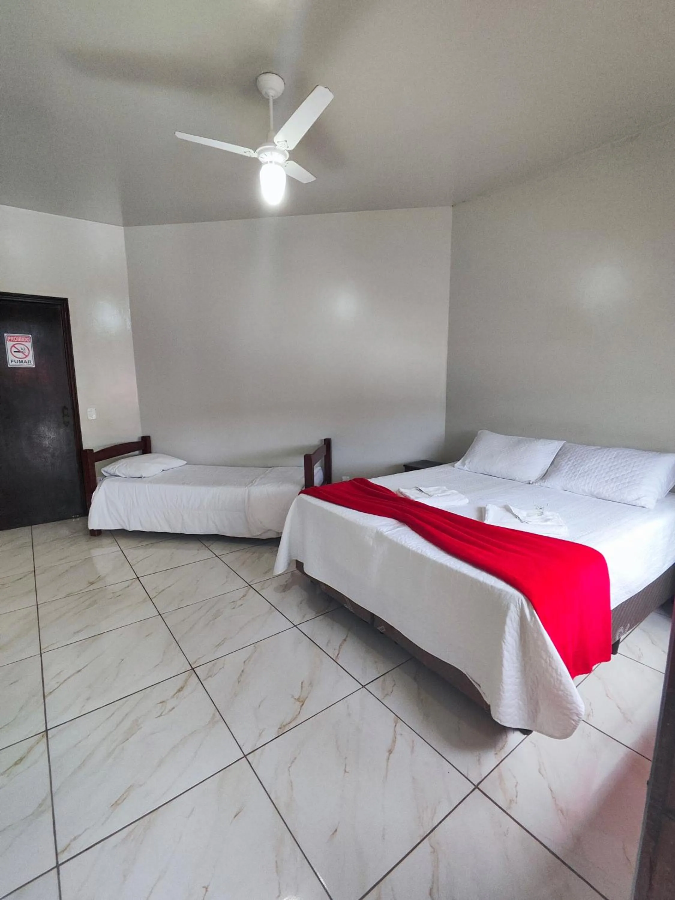 Bed in Pousada Sinhá Moça