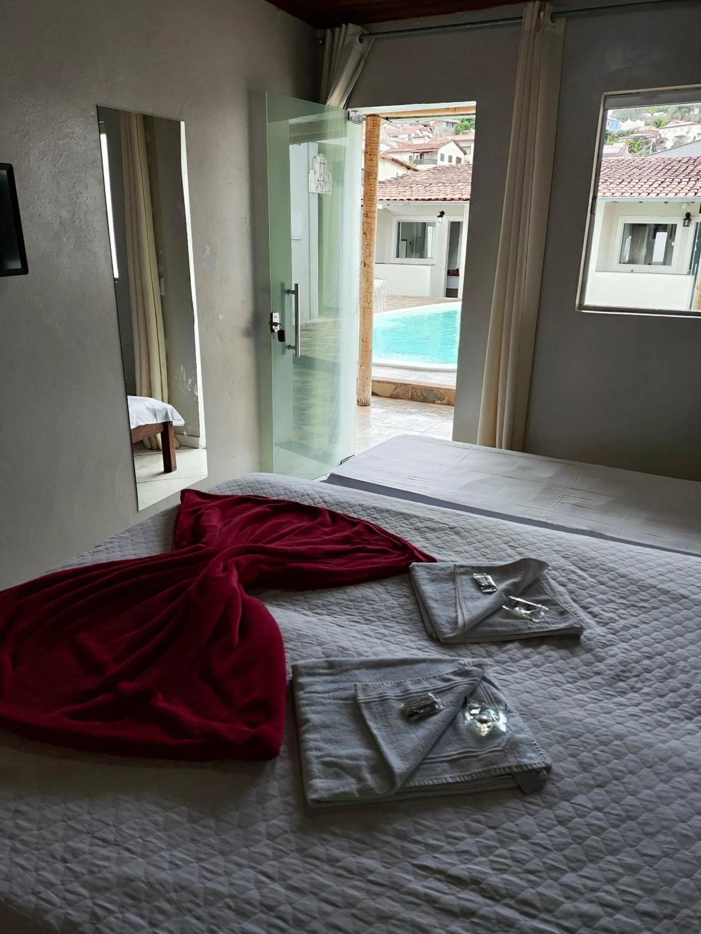 Bed in Pousada Sinhá Moça
