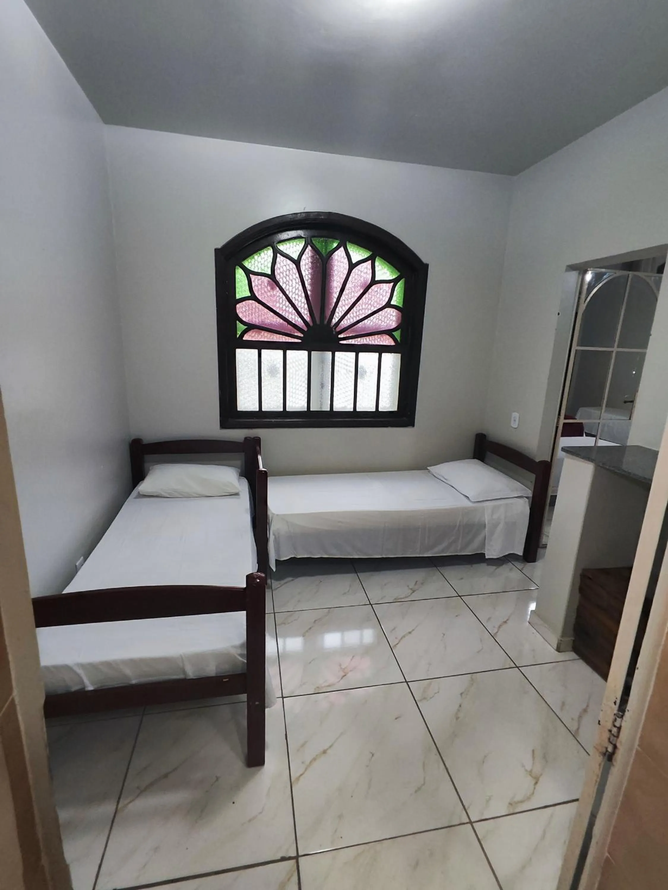 Bed in Pousada Sinhá Moça