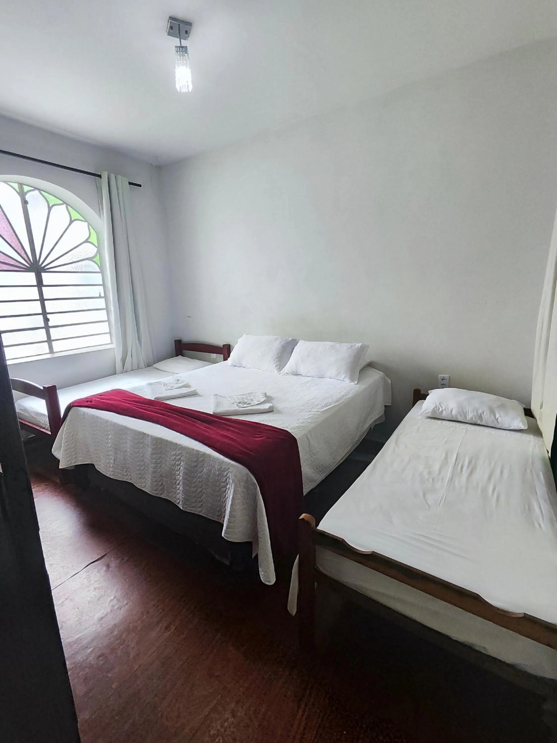 Bed in Pousada Sinhá Moça