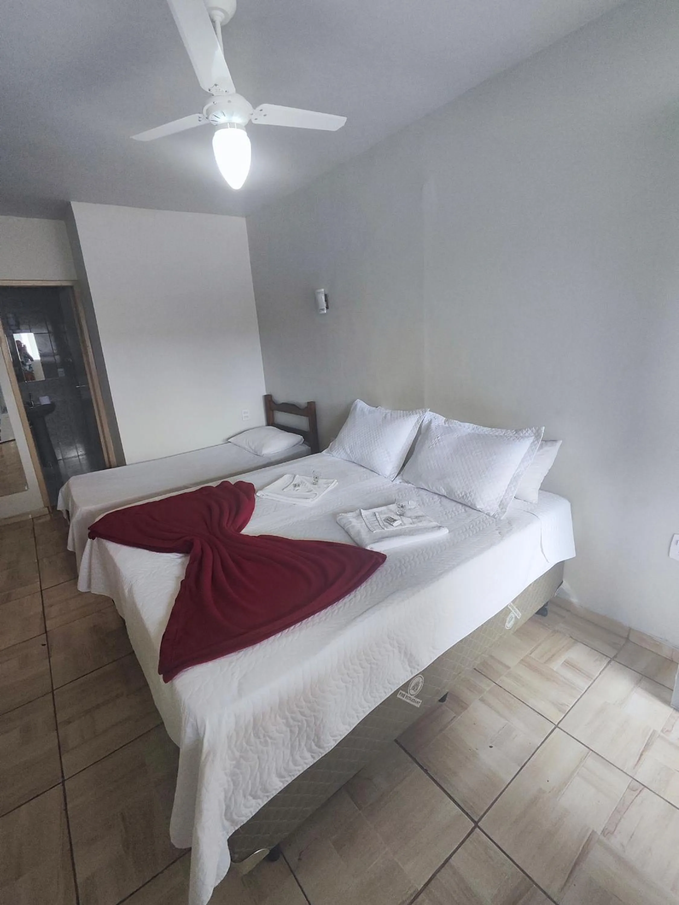 Bed in Pousada Sinhá Moça