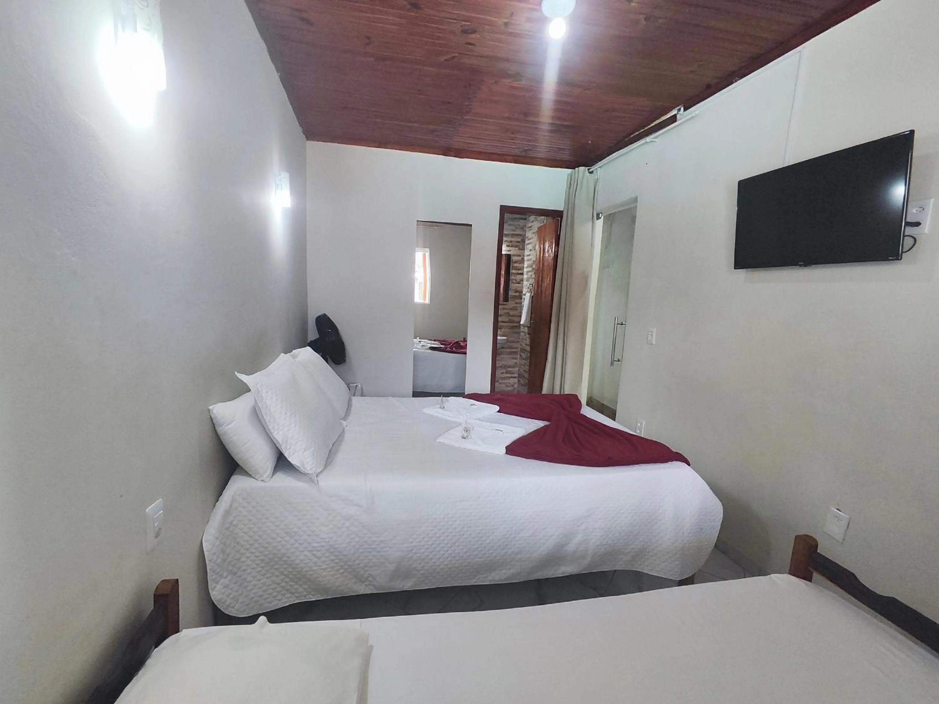 Bed in Pousada Sinhá Moça