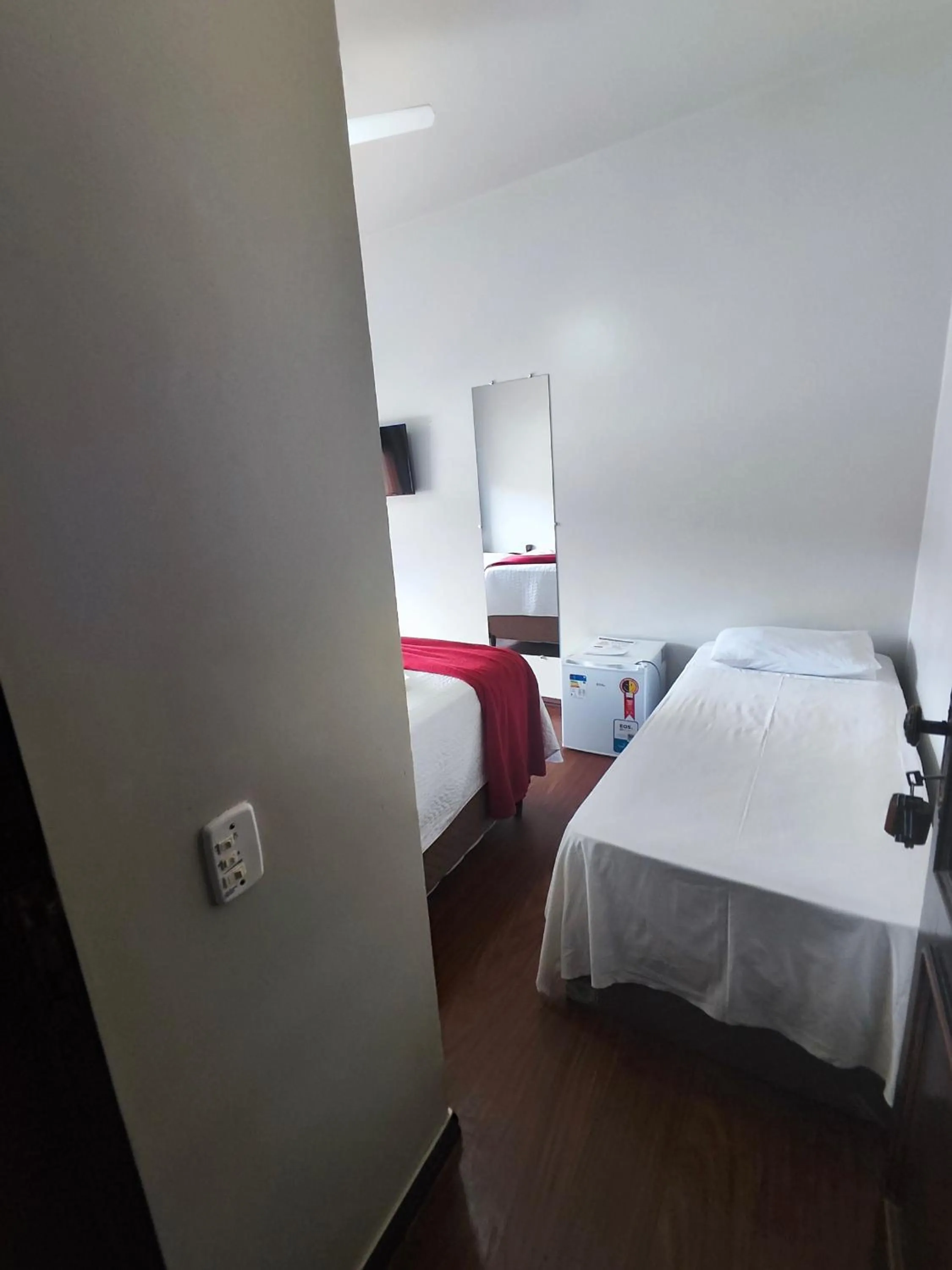 Bed in Pousada Sinhá Moça