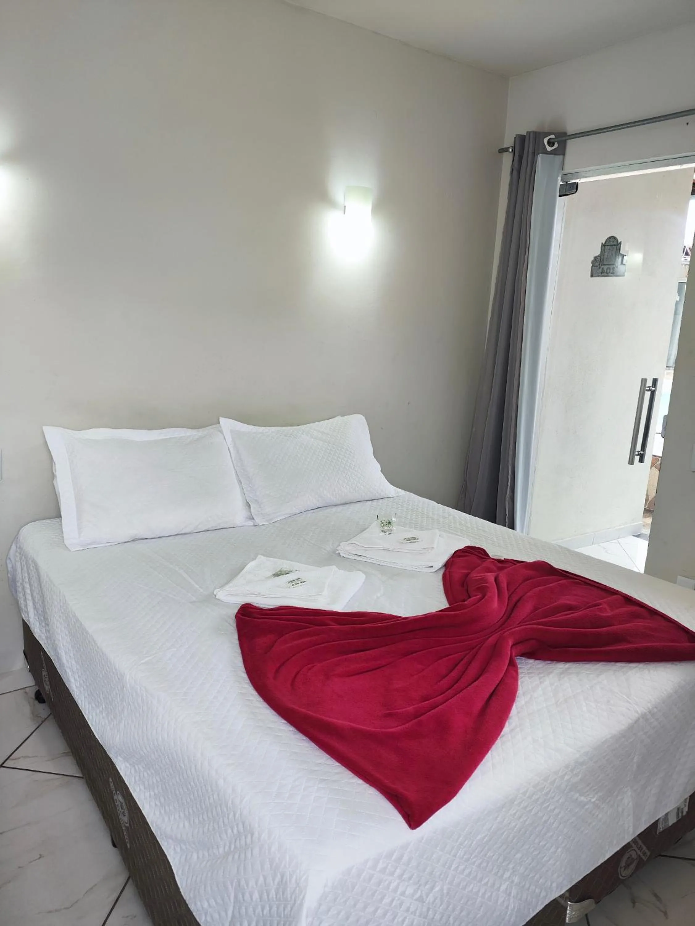 Bed in Pousada Sinhá Moça