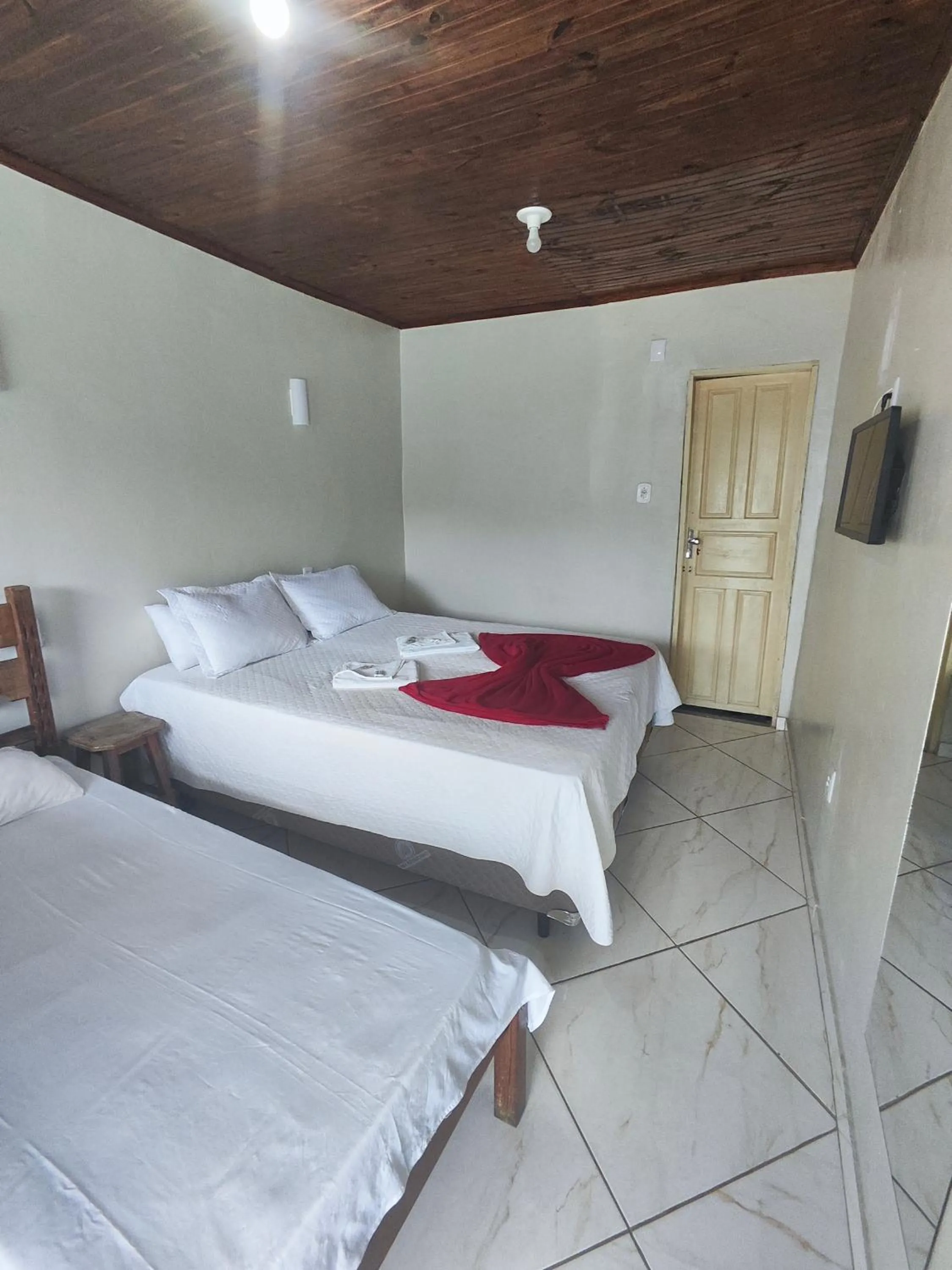Bed in Pousada Sinhá Moça