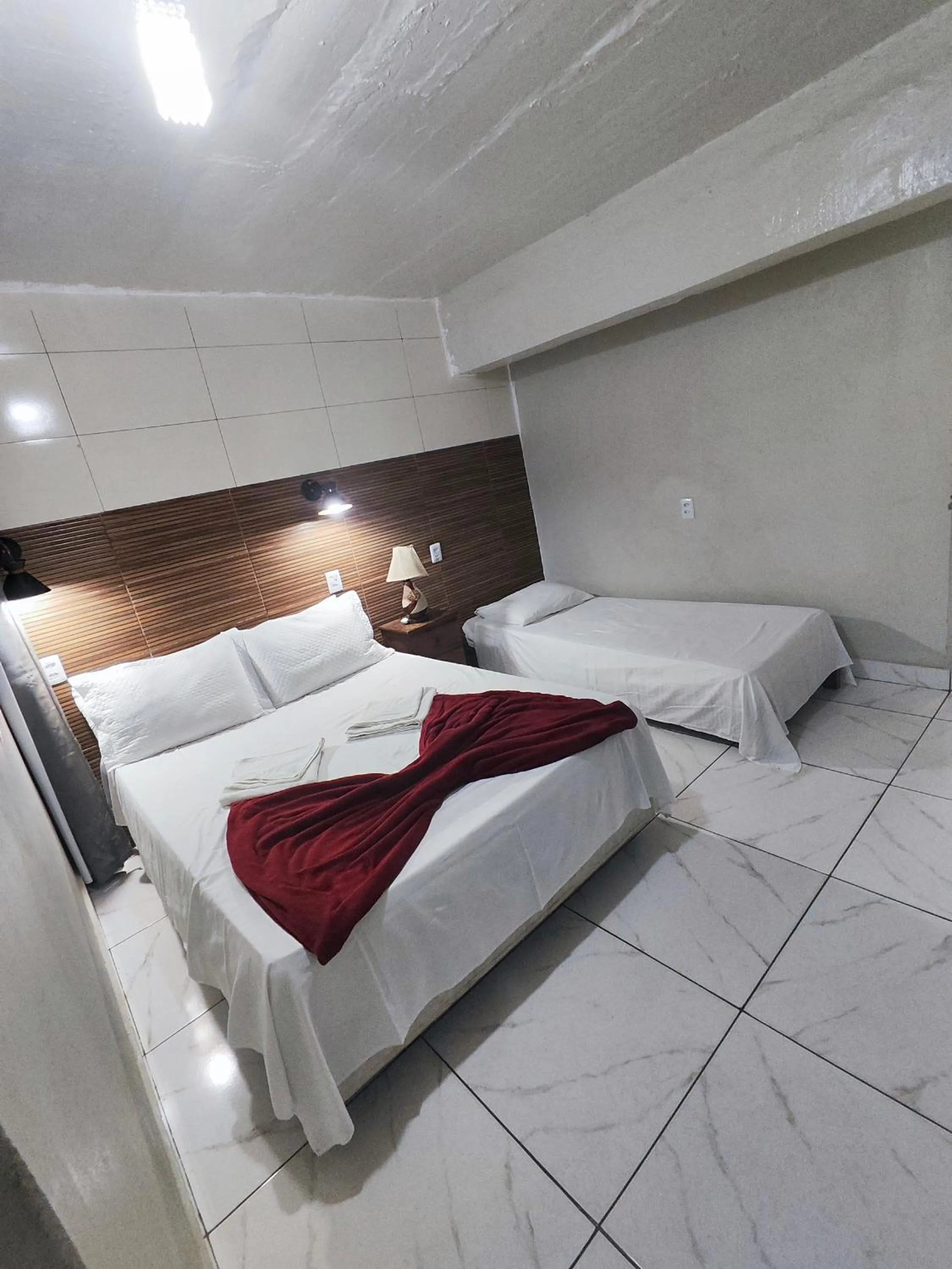 Bed in Pousada Sinhá Moça