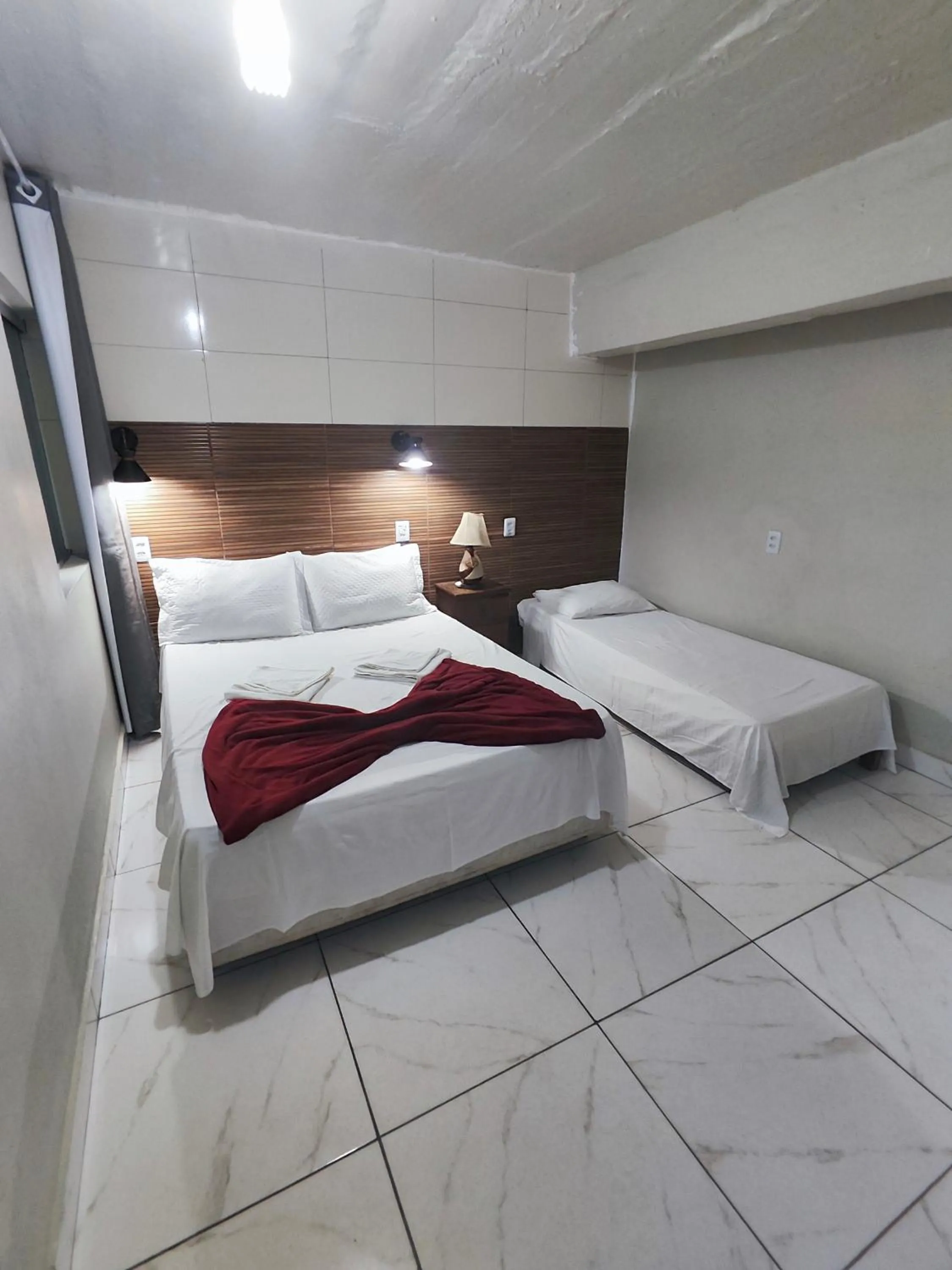 Bed in Pousada Sinhá Moça