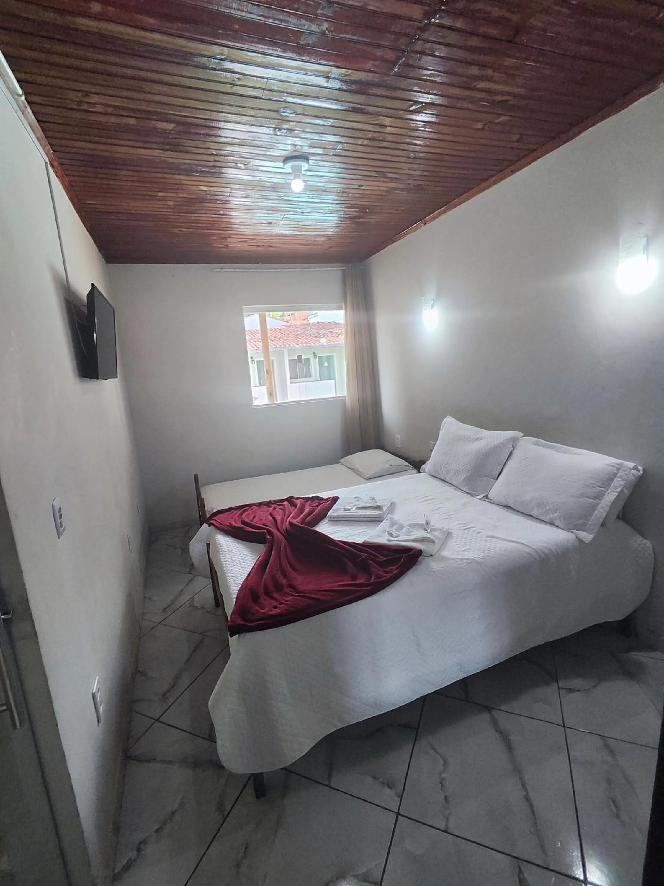 Bed in Pousada Sinhá Moça