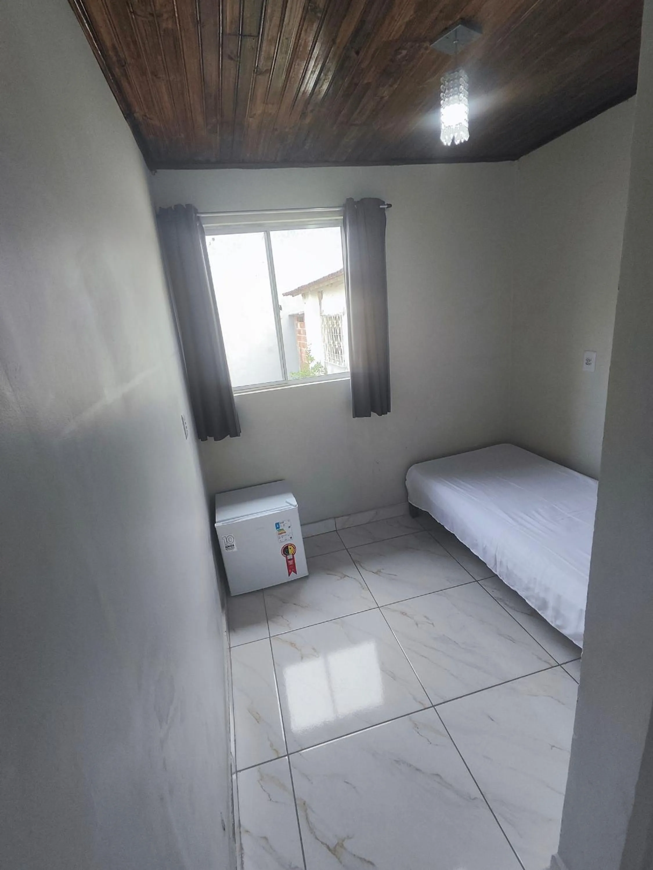 Bed in Pousada Sinhá Moça