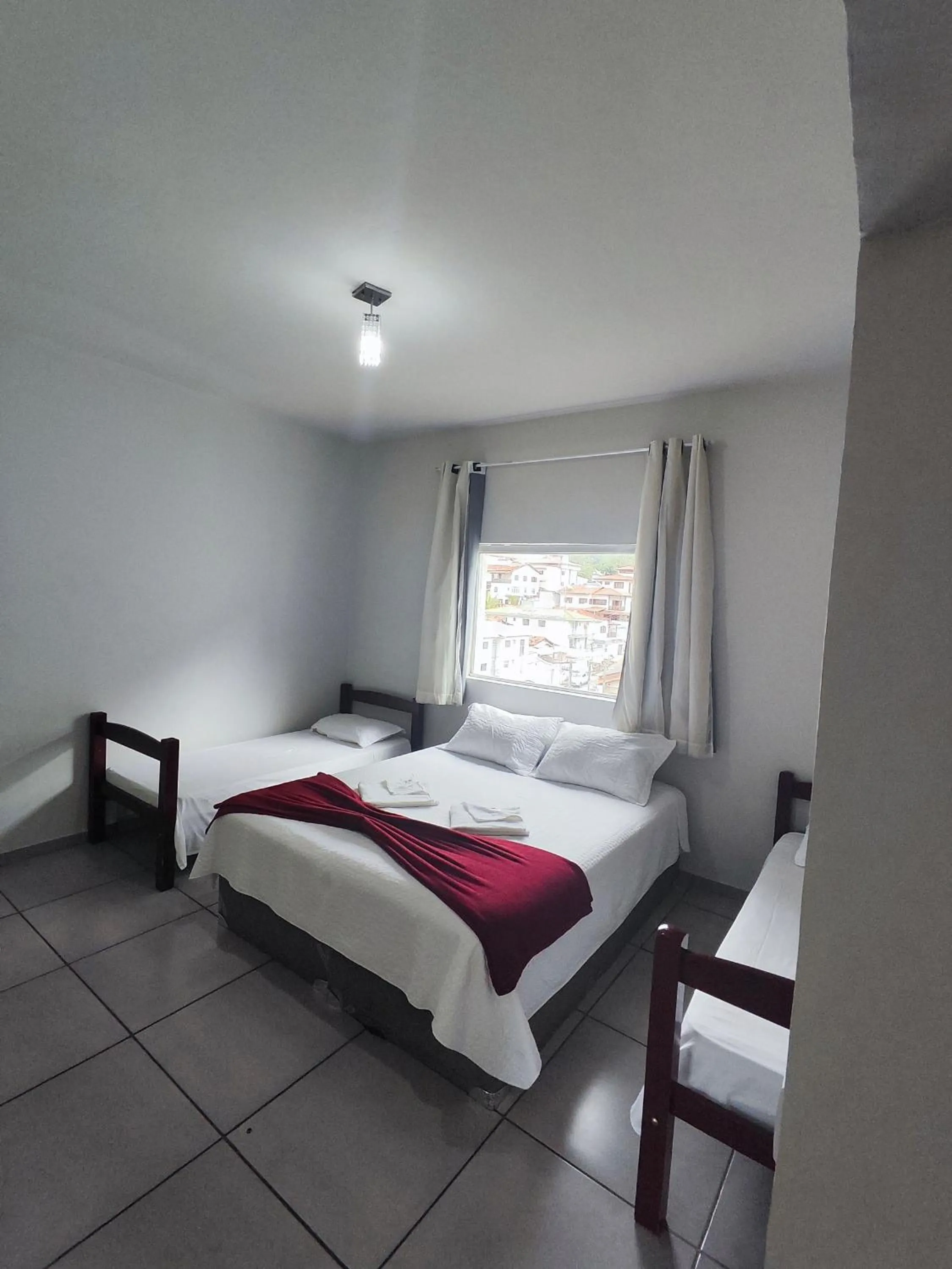 Bed in Pousada Sinhá Moça