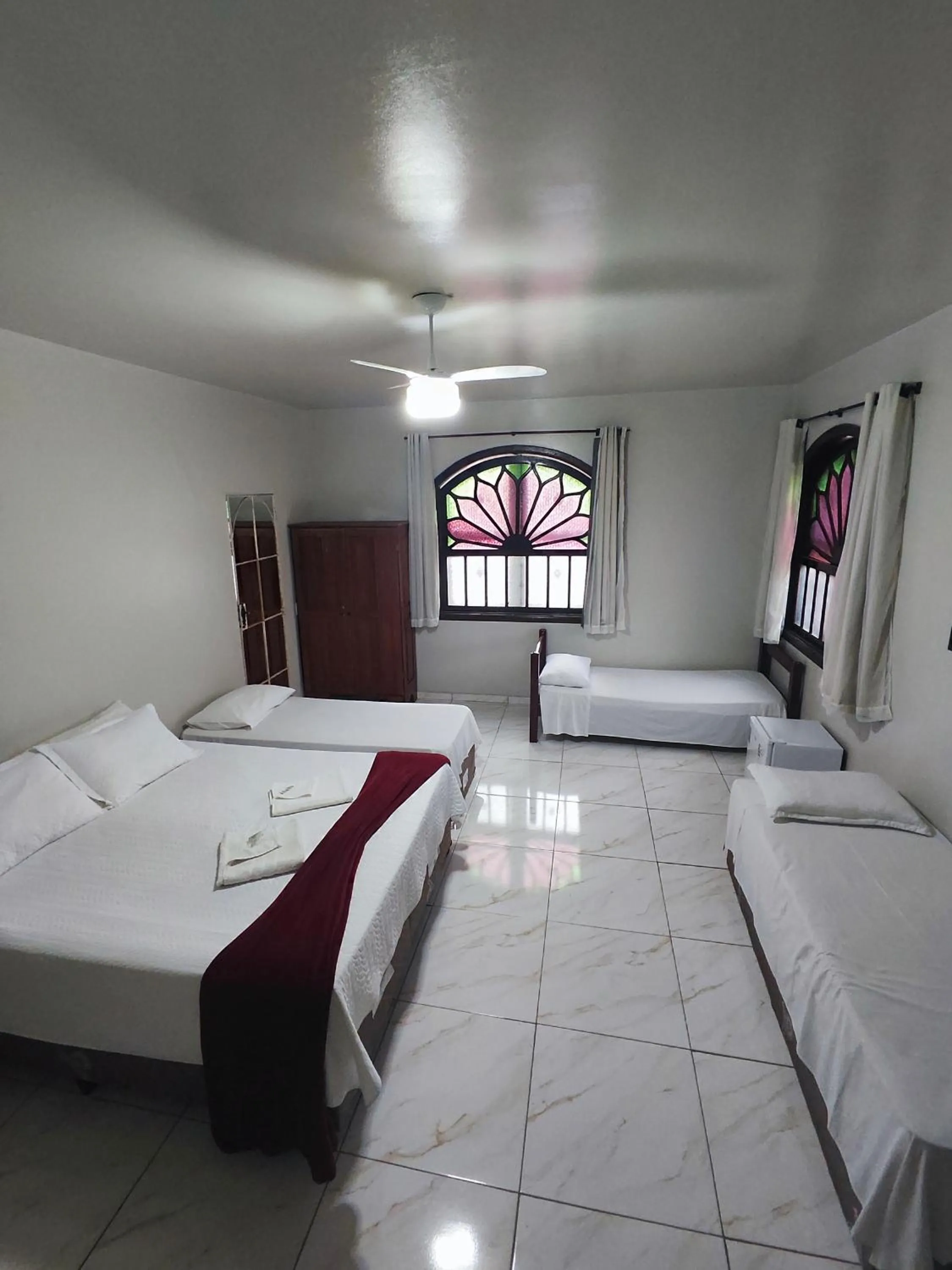 Bed in Pousada Sinhá Moça