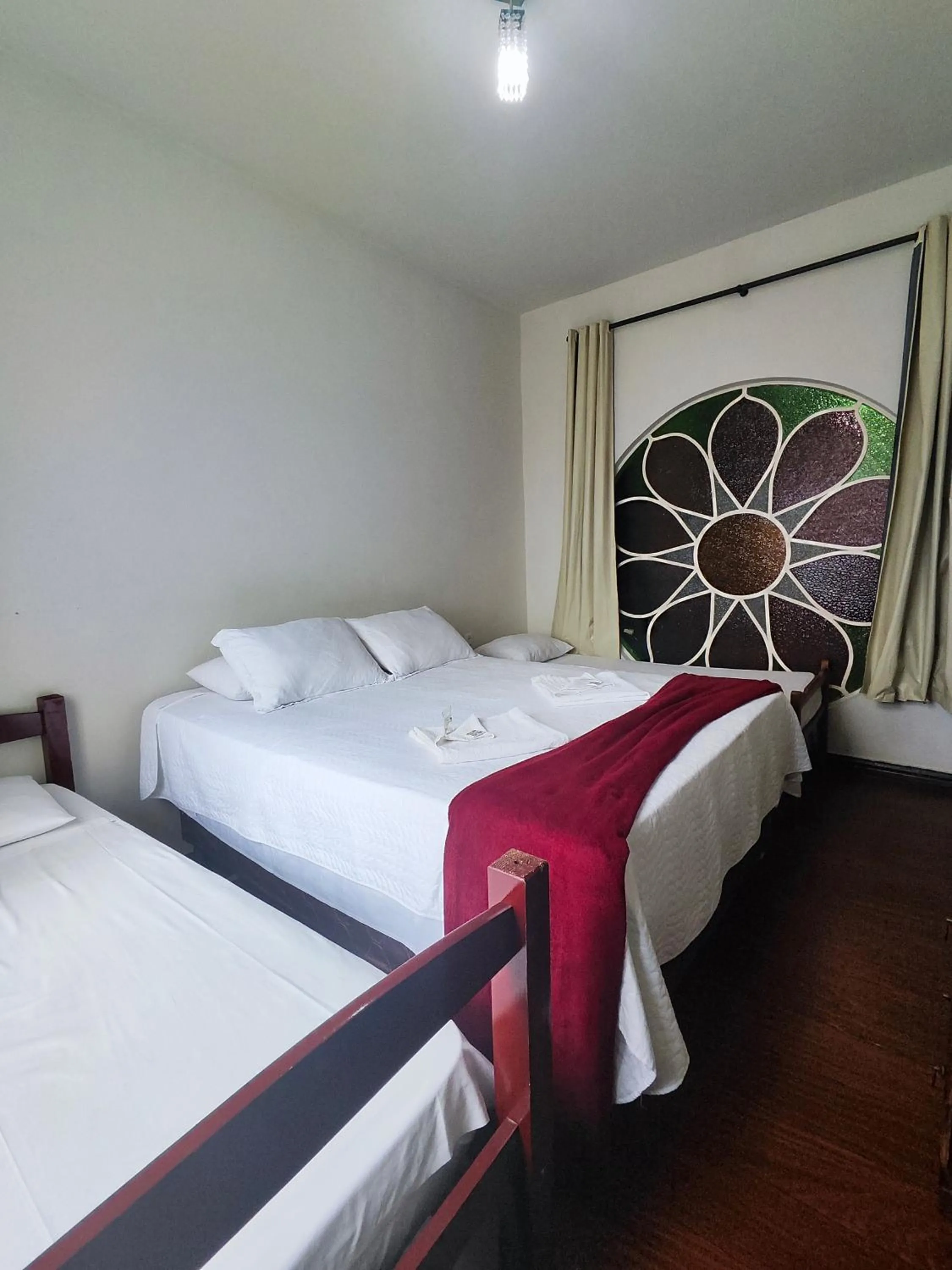 Bed in Pousada Sinhá Moça