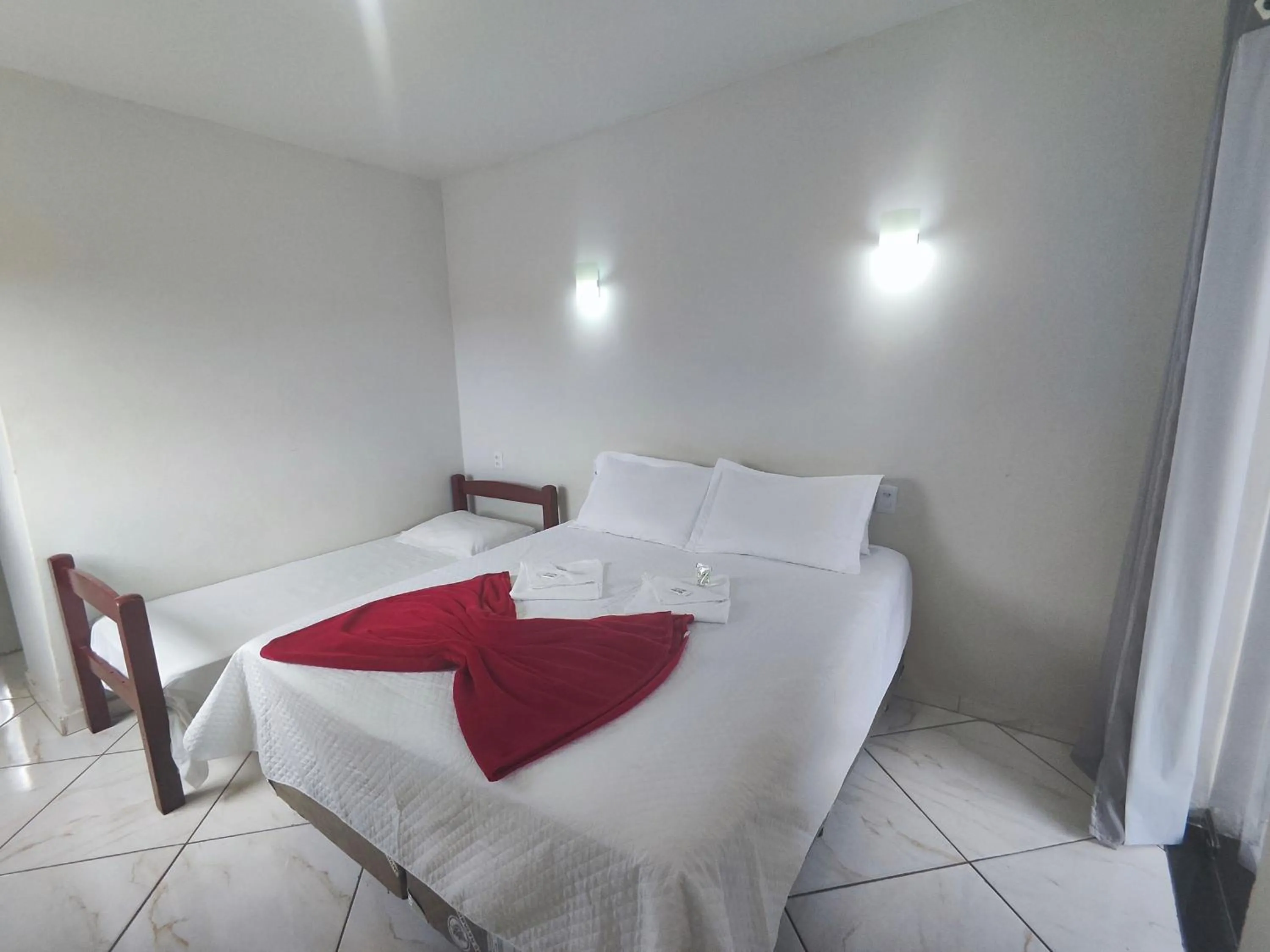 Bed in Pousada Sinhá Moça