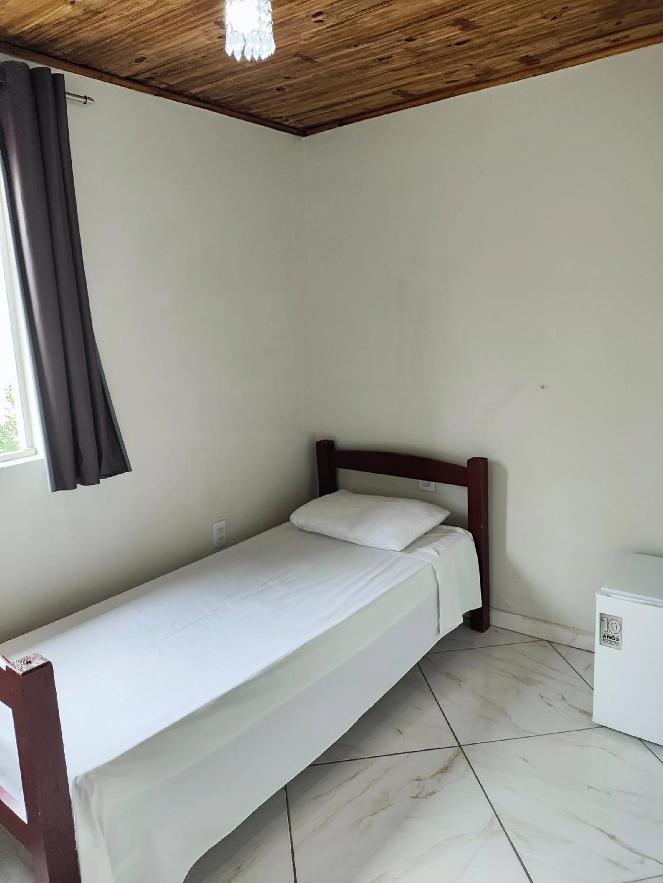 Bed in Pousada Sinhá Moça