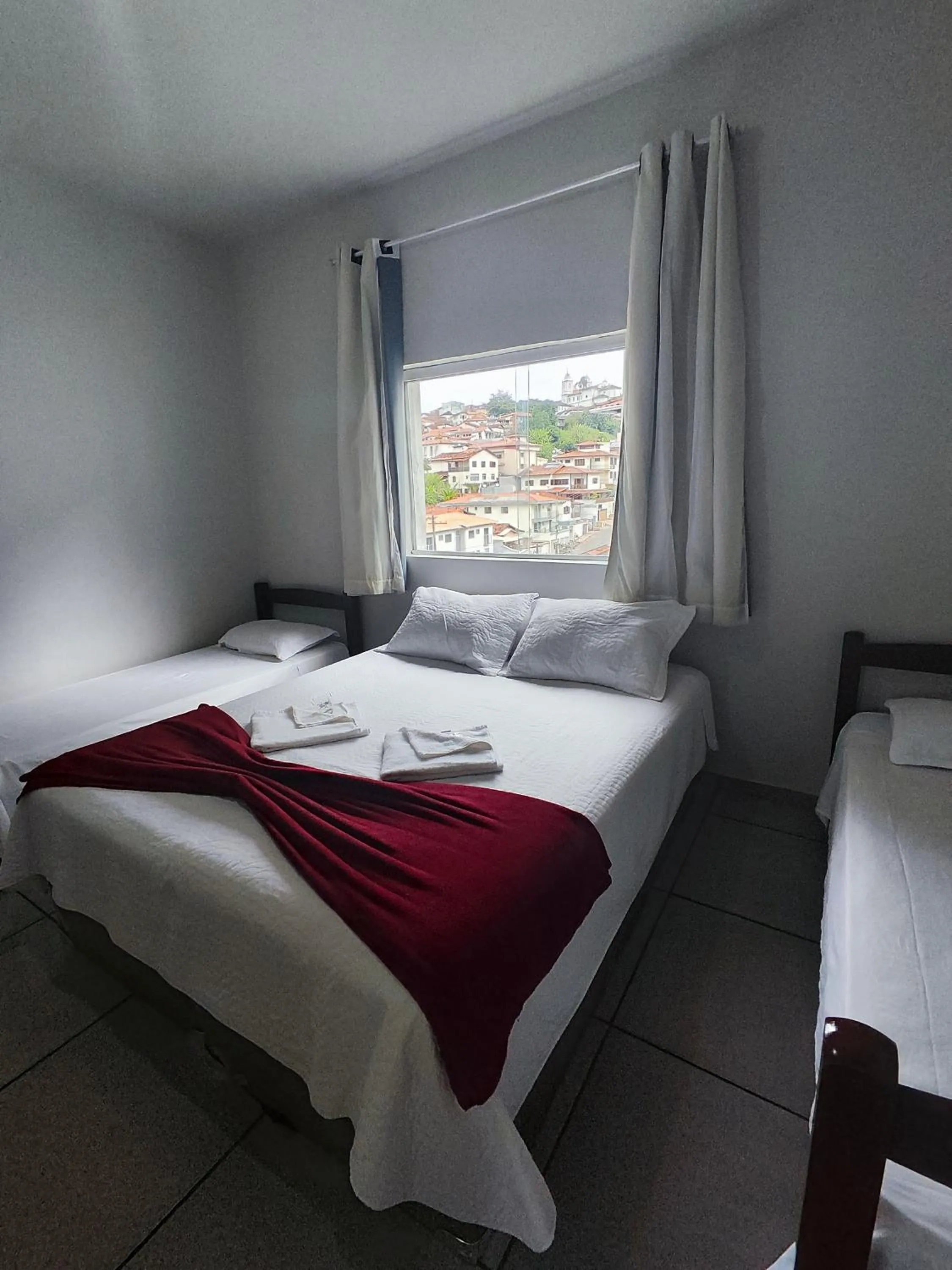 Bed in Pousada Sinhá Moça