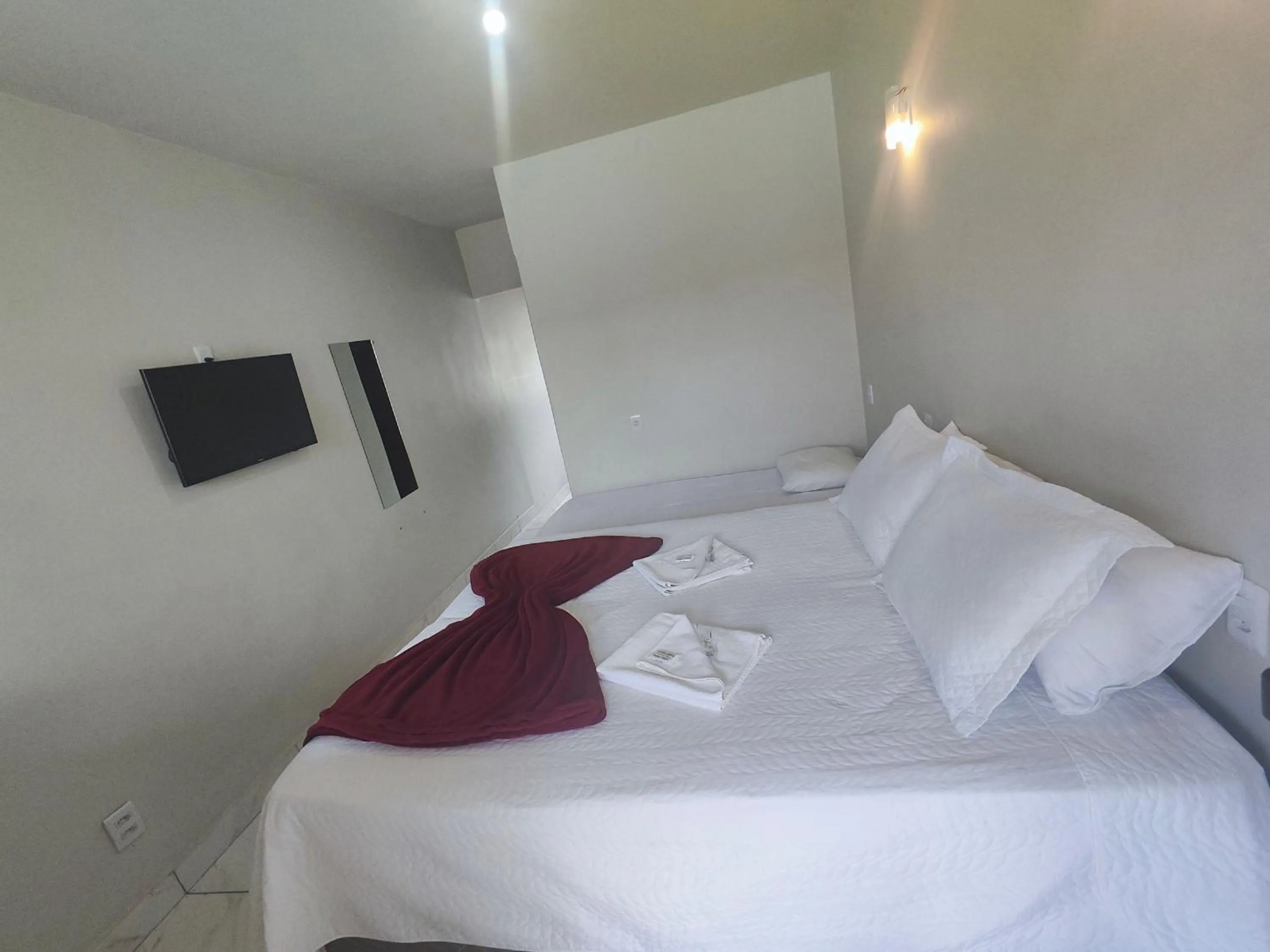 Bed in Pousada Sinhá Moça