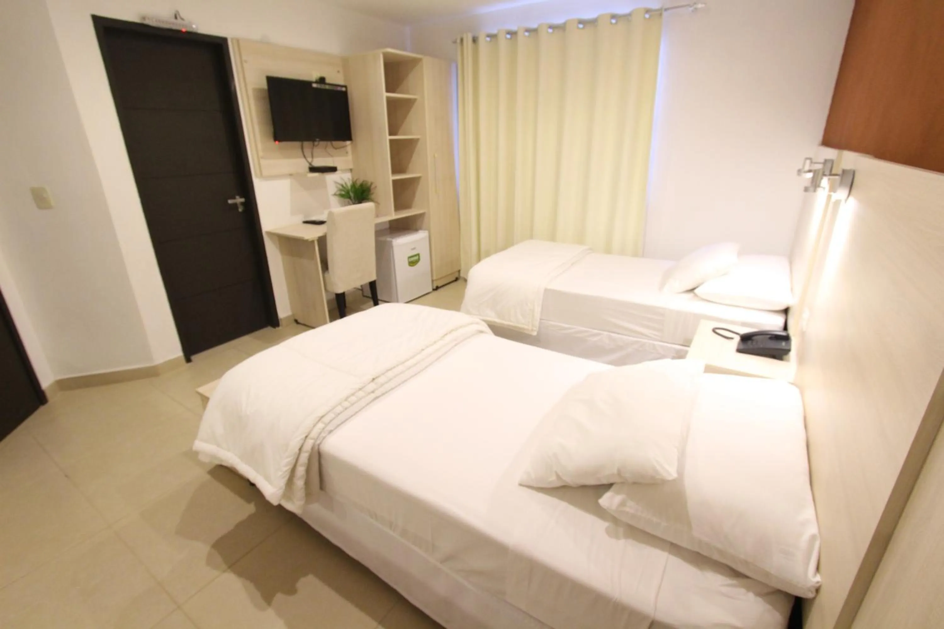 TV and multimedia, Bed in Danieri Asunción Hotel