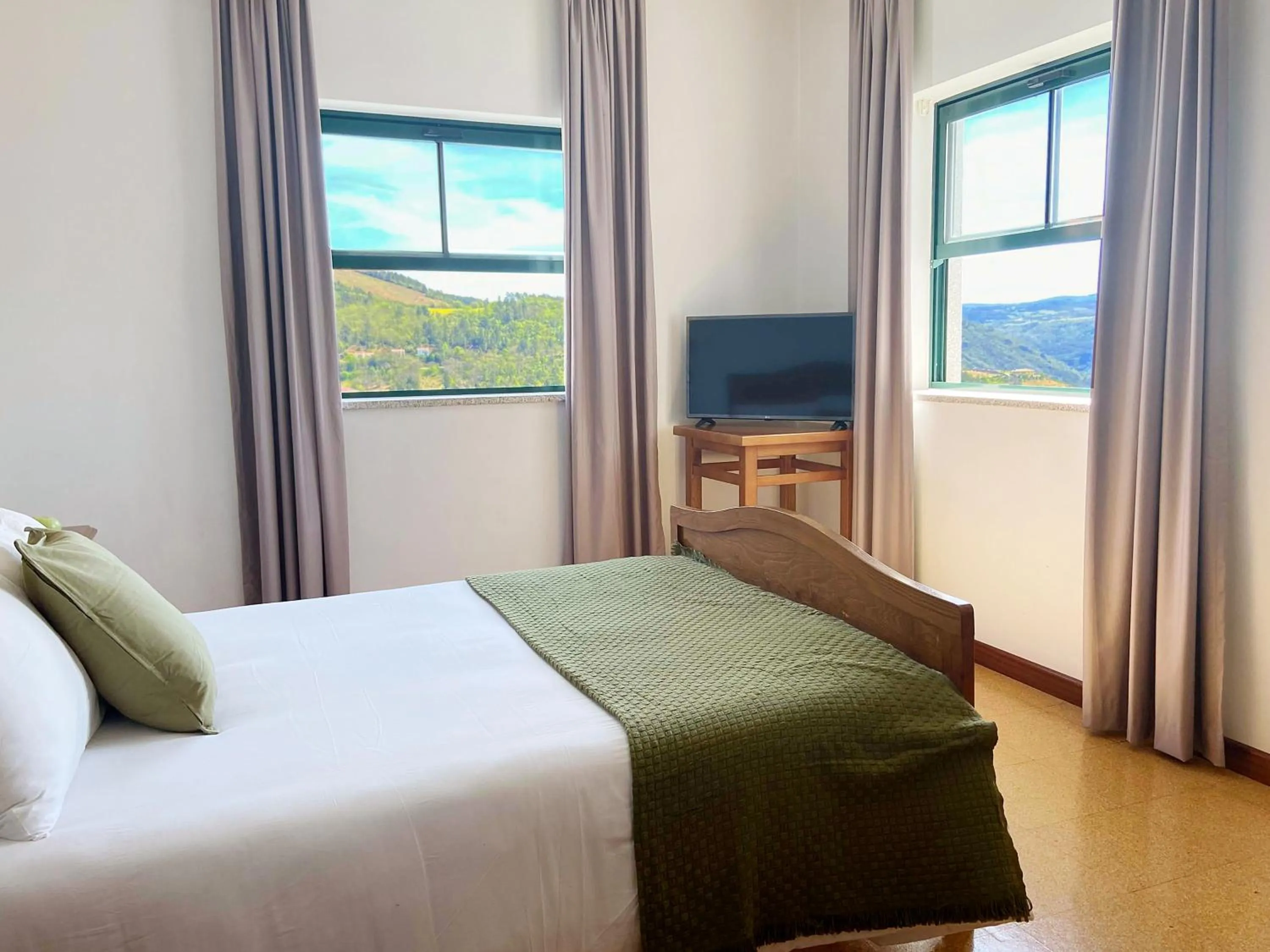 Bed in Vinhais Hotel