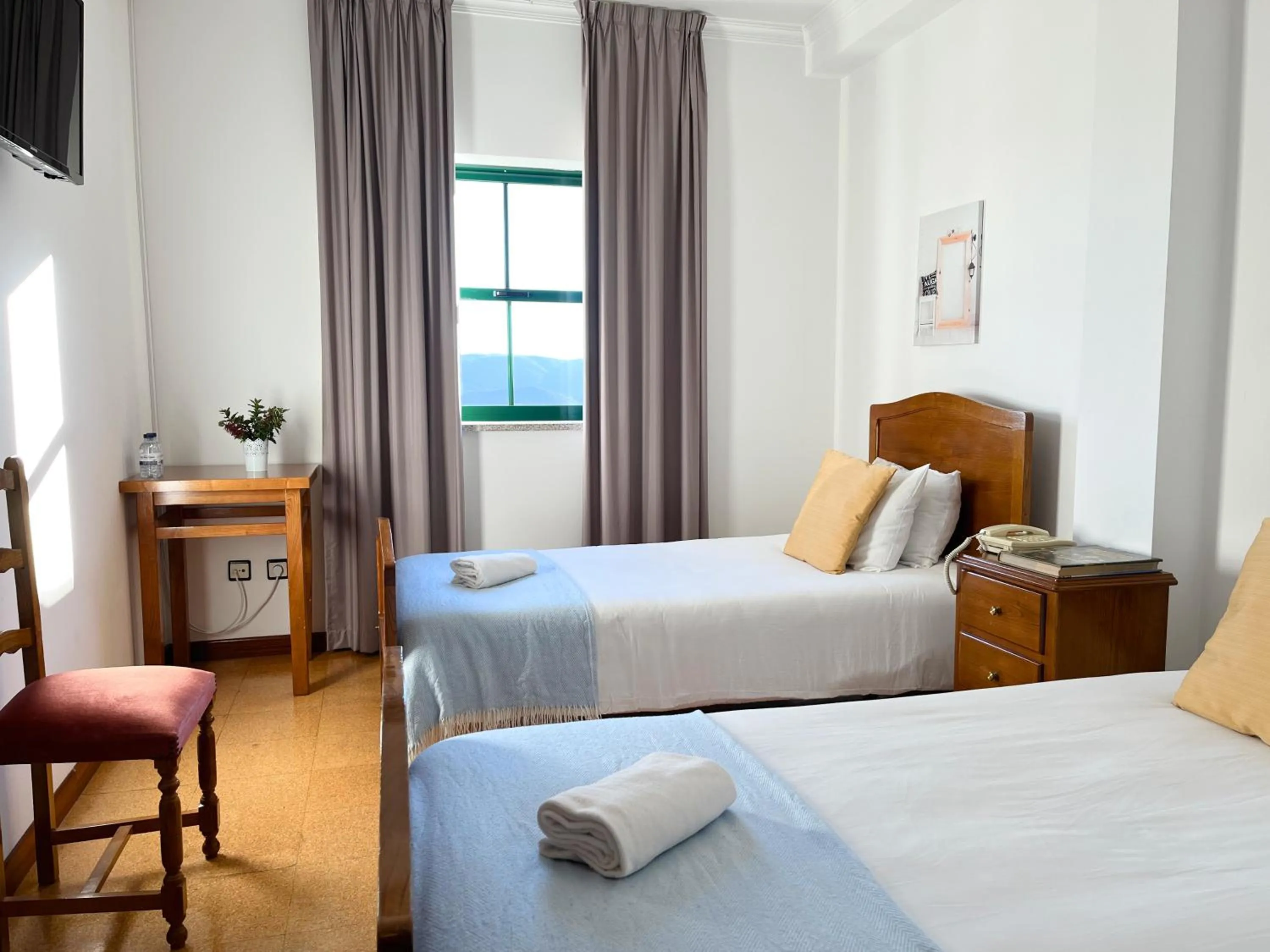 View (from property/room), Bed in Vinhais Hotel