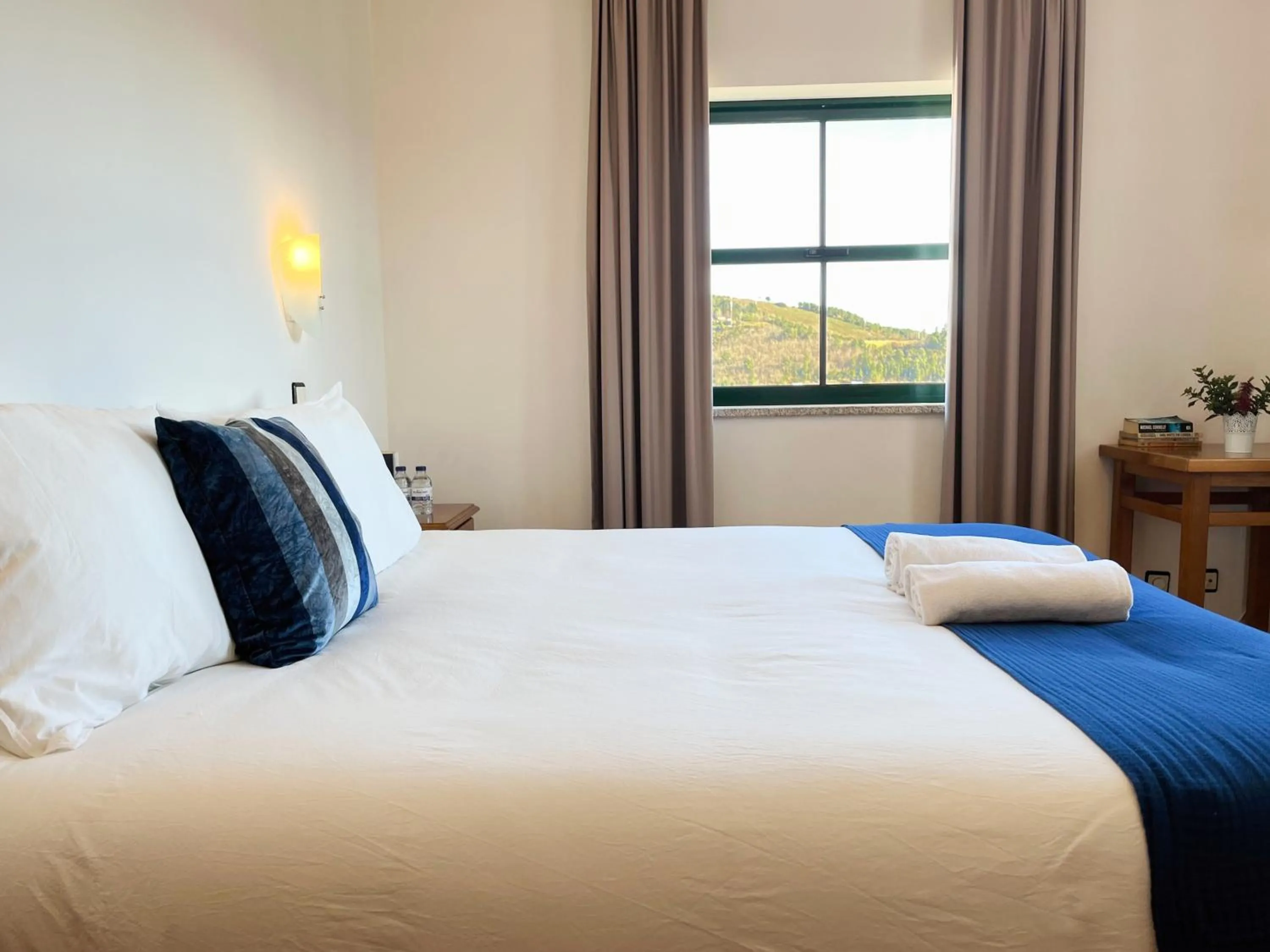 View (from property/room), Bed in Vinhais Hotel