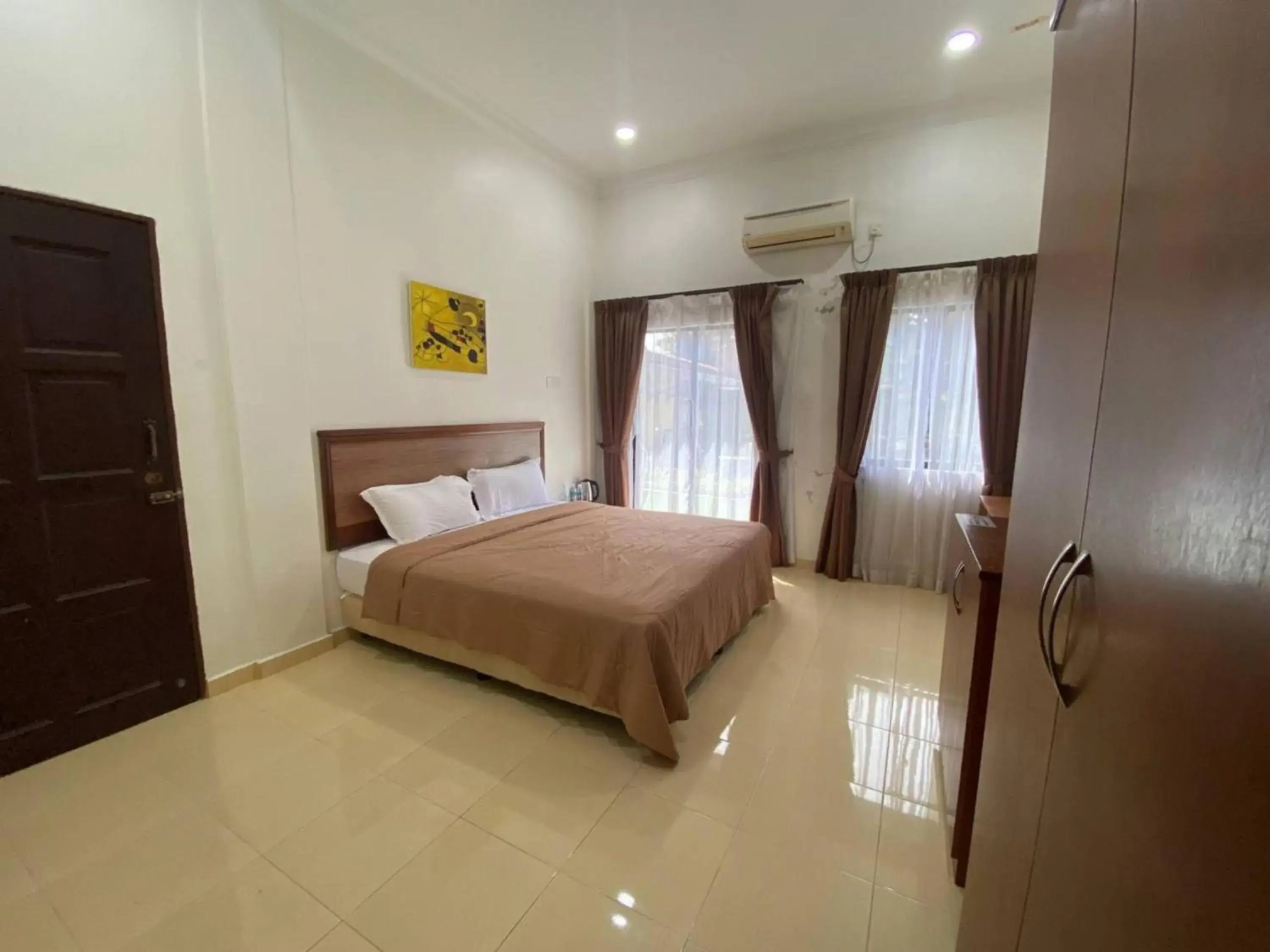 Bedroom, Bed in Capital O 91094 Hotel & Chalet Sportfishing Bedroom, Bed in Capital O 91094 Hotel & Chalet Sportfishing