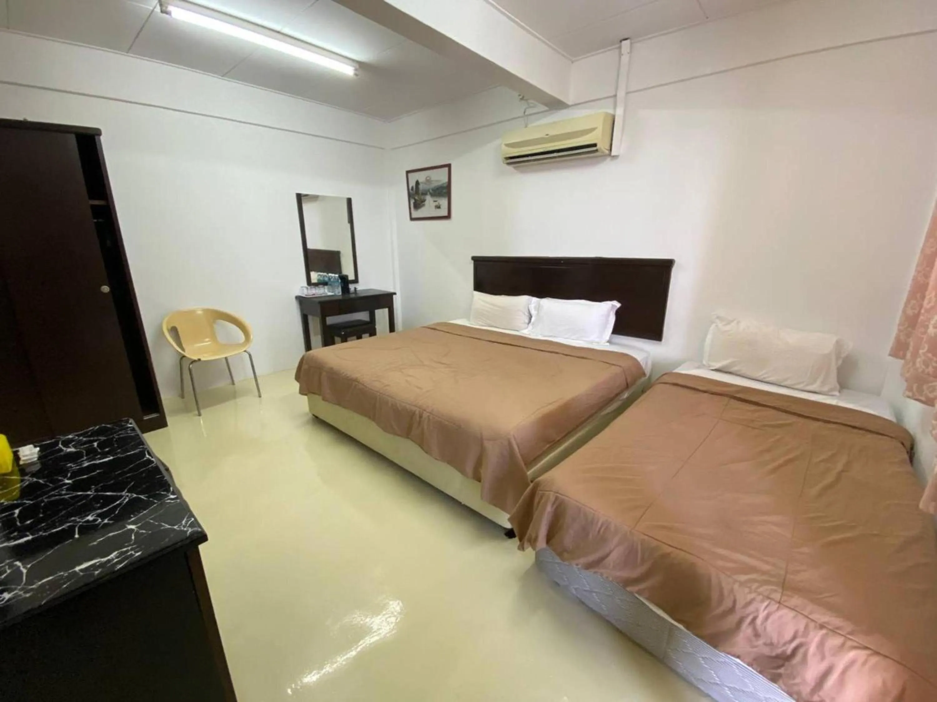 Photo of the whole room, Bed in Capital O 91094 Hotel & Chalet Sportfishing