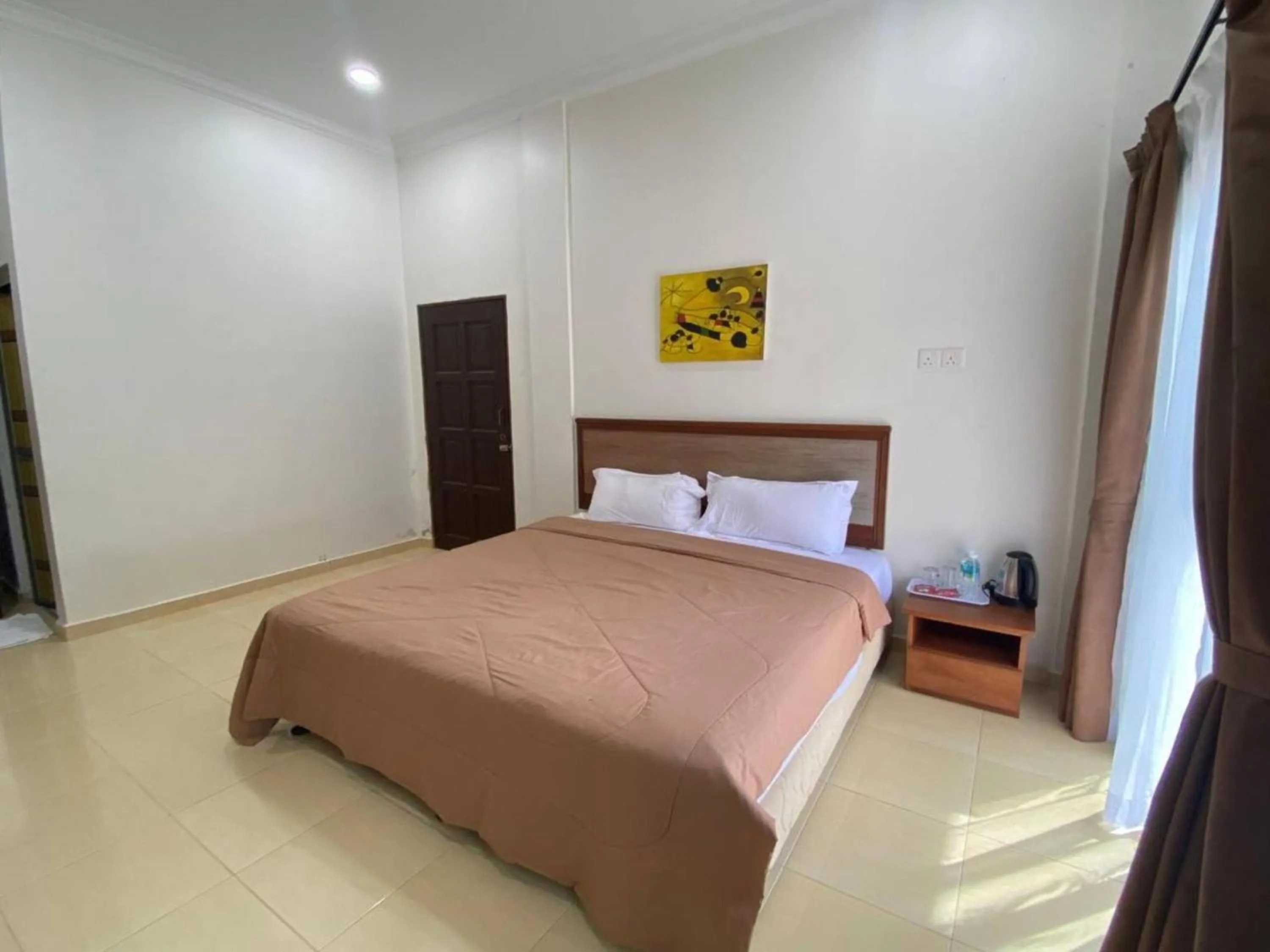 Bedroom, Bed in Capital O 91094 Hotel & Chalet Sportfishing