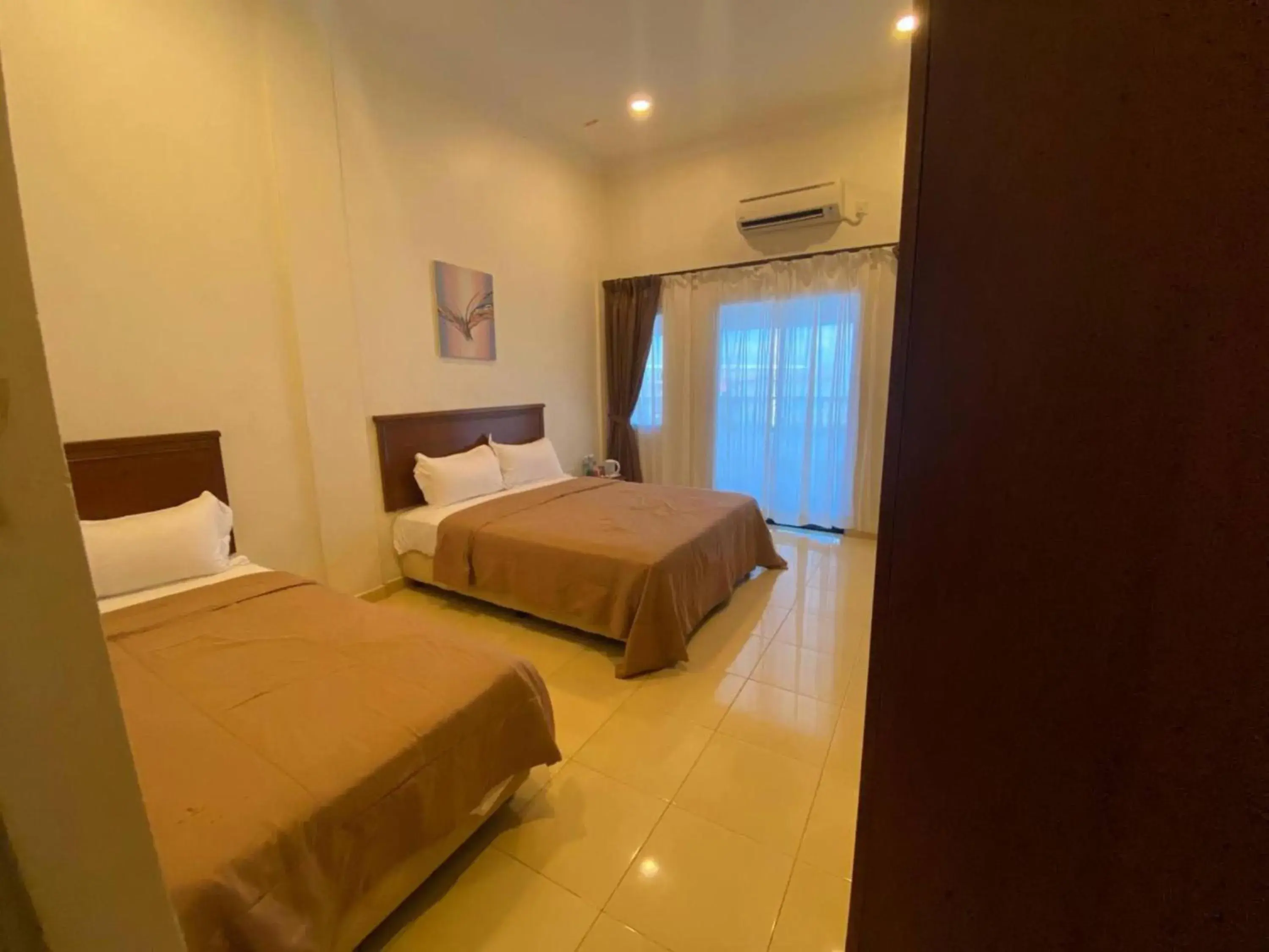 View (from property/room), Bed in Capital O 91094 Hotel & Chalet Sportfishing View (from property/room), Bed in Capital O 91094 Hotel & Chalet Sportfishing