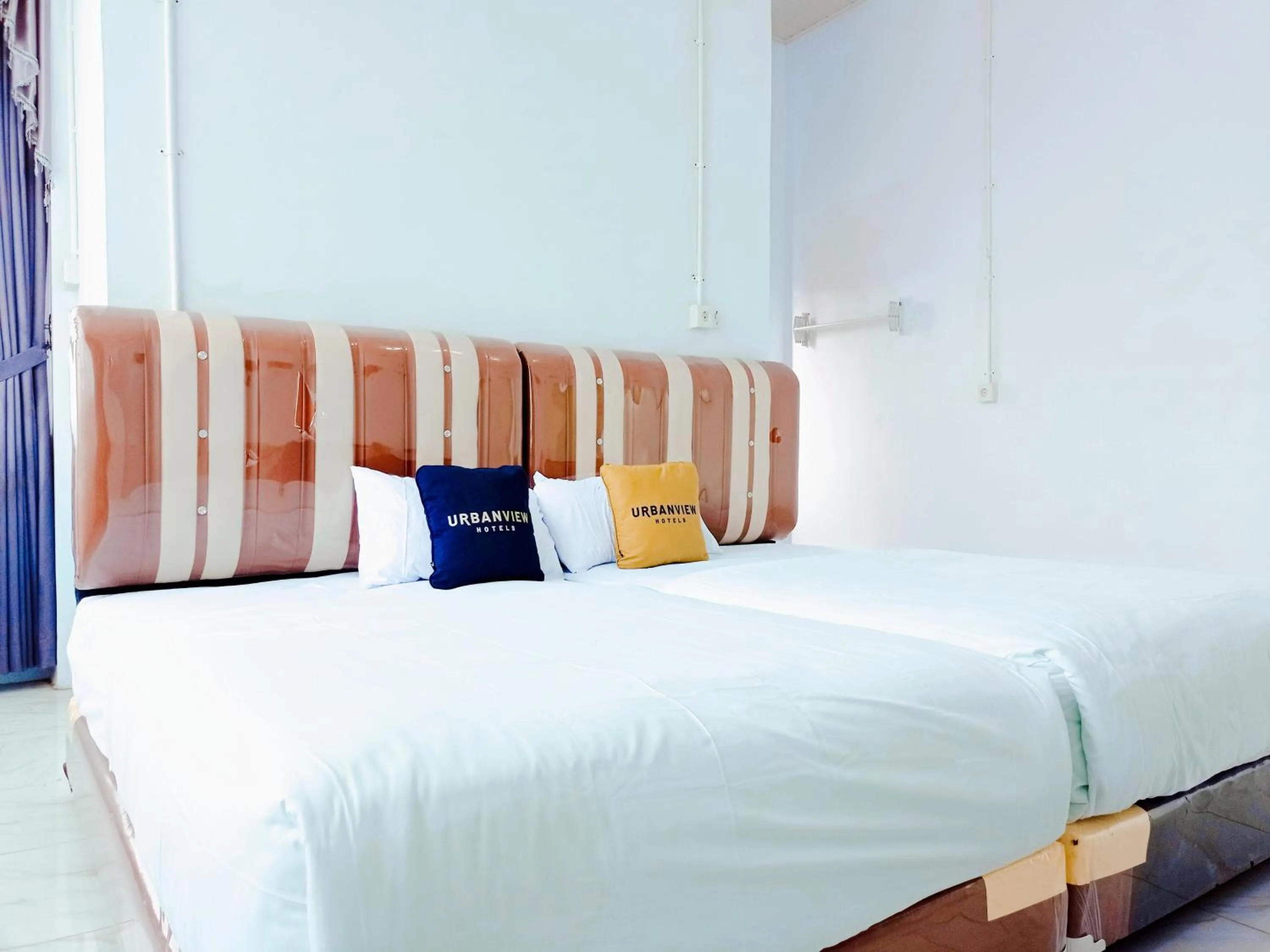 Bedroom, Bed in Urbanview Hotel at Guest House Bukit Sion Bengkulu