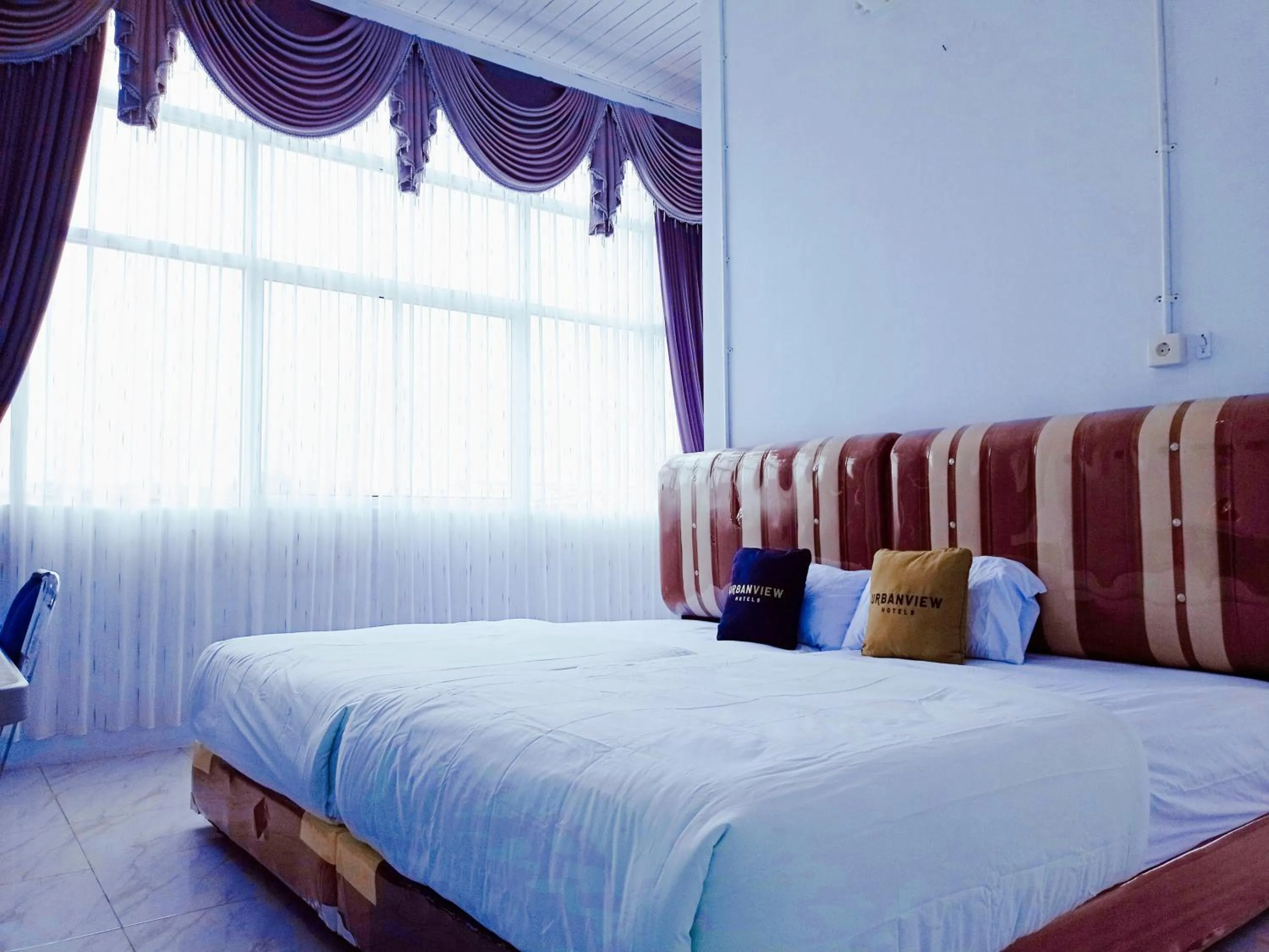 Bedroom, Bed in Urbanview Hotel at Guest House Bukit Sion Bengkulu