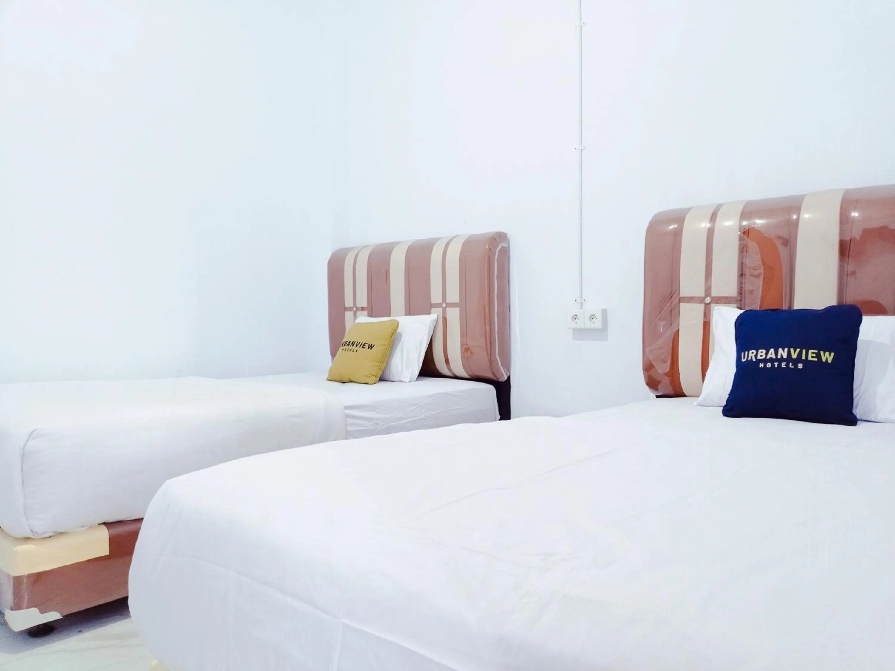 Bedroom, Bed in Urbanview Hotel at Guest House Bukit Sion Bengkulu