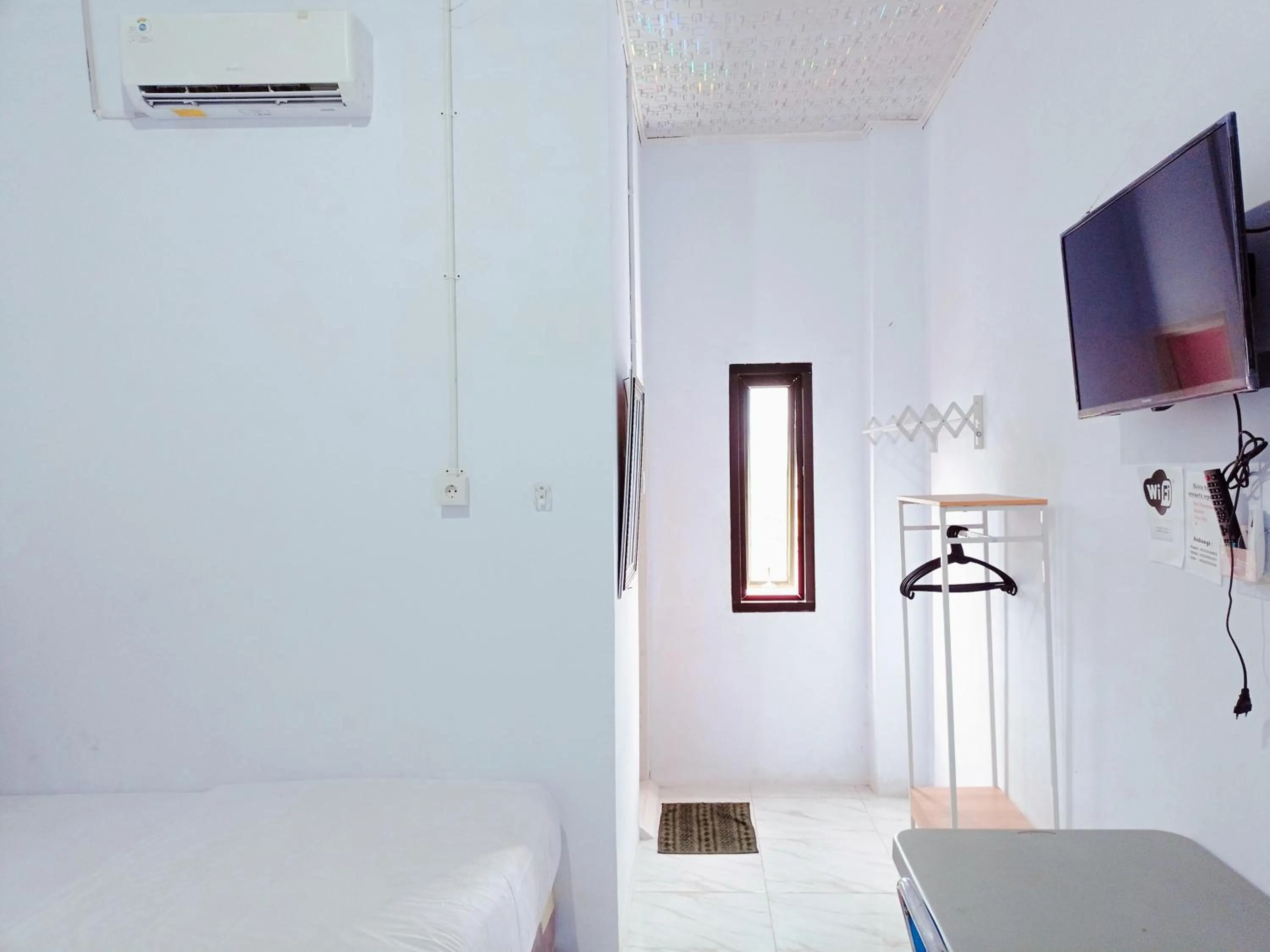Bedroom, Bed in Urbanview Hotel at Guest House Bukit Sion Bengkulu