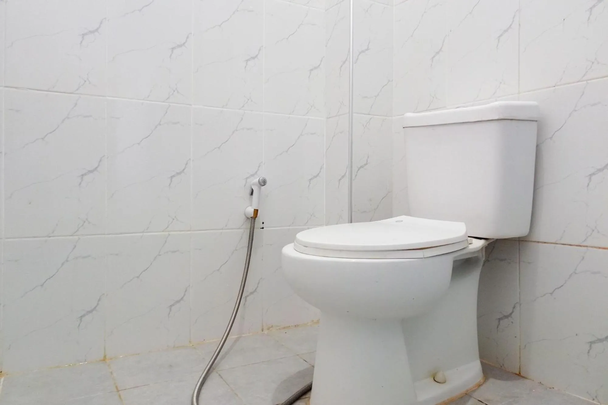 Bathroom in Urbanview Hotel at Guest House Bukit Sion Bengkulu