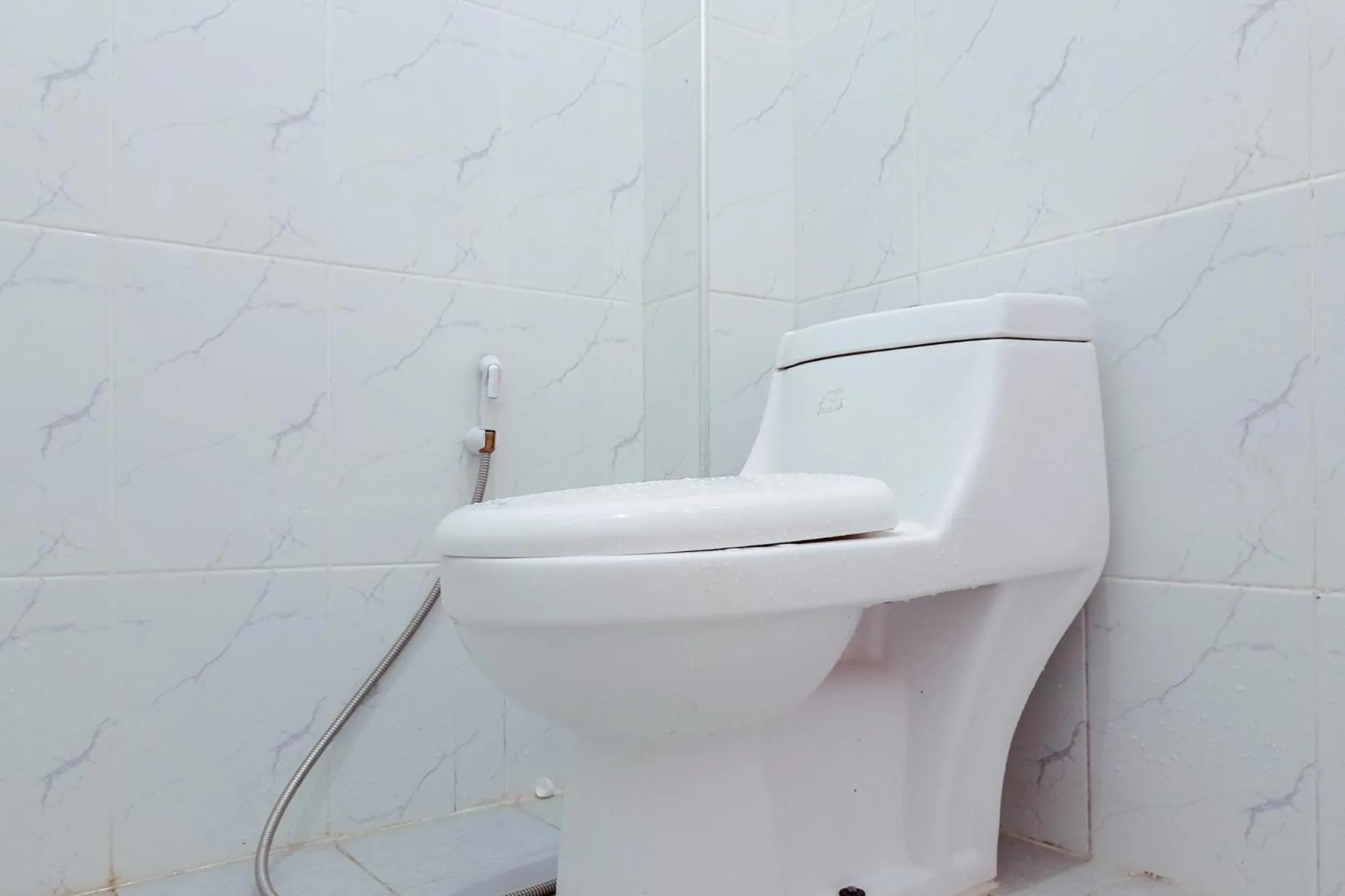 Bathroom in Urbanview Hotel at Guest House Bukit Sion Bengkulu
