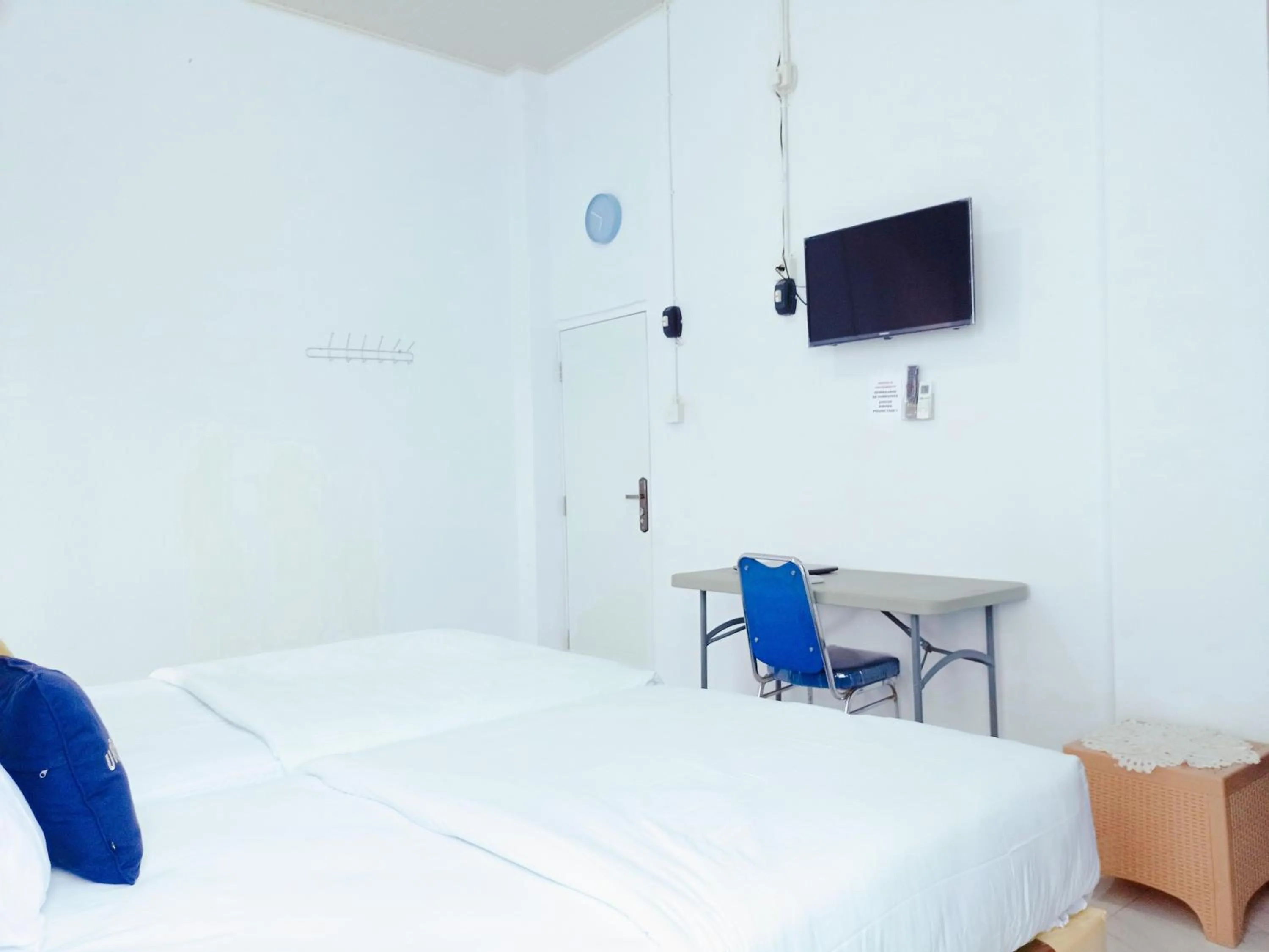 Bedroom, Bed in Urbanview Hotel at Guest House Bukit Sion Bengkulu