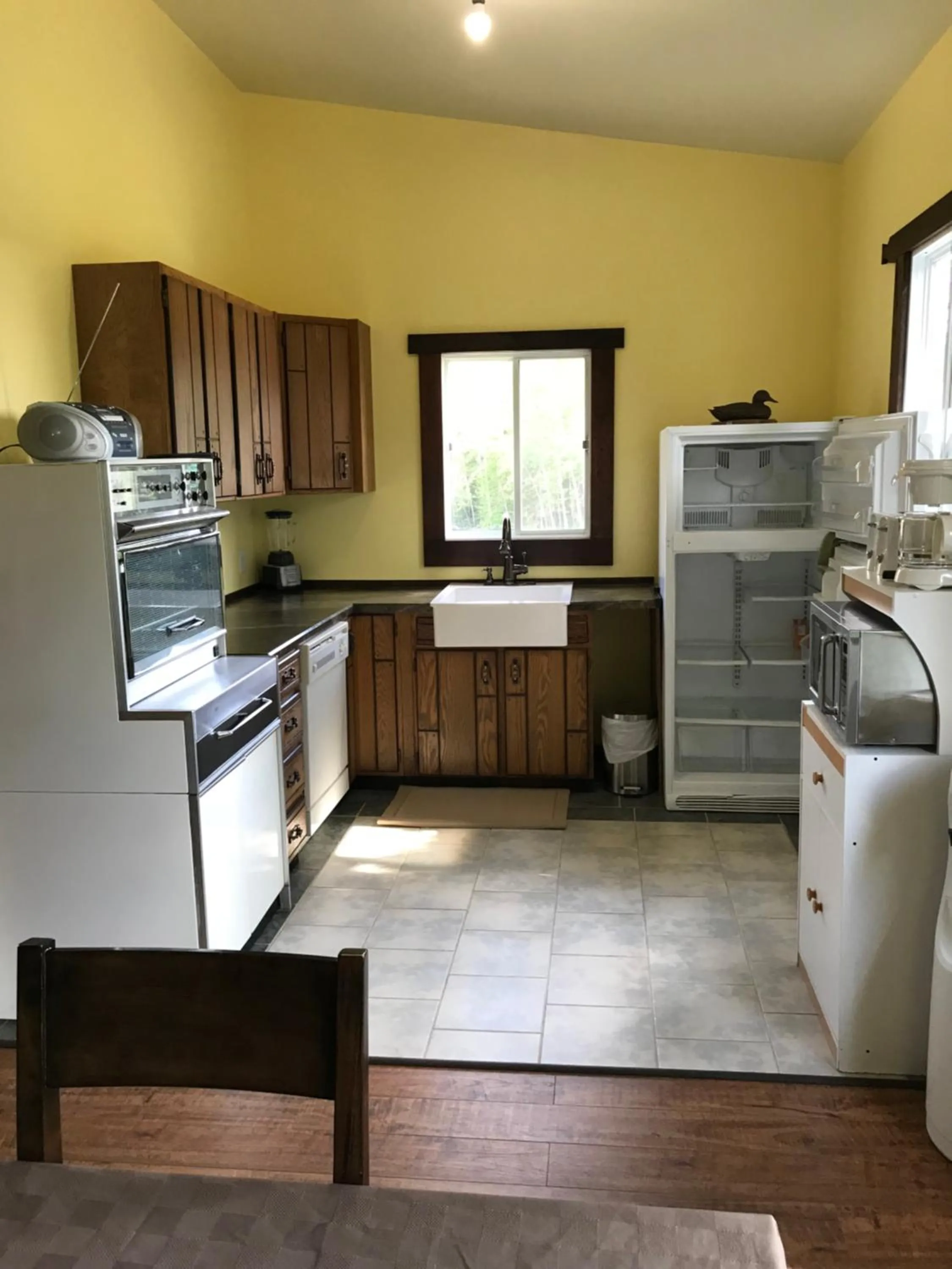 Kitchen or kitchenette in Mowat Landing Cottages