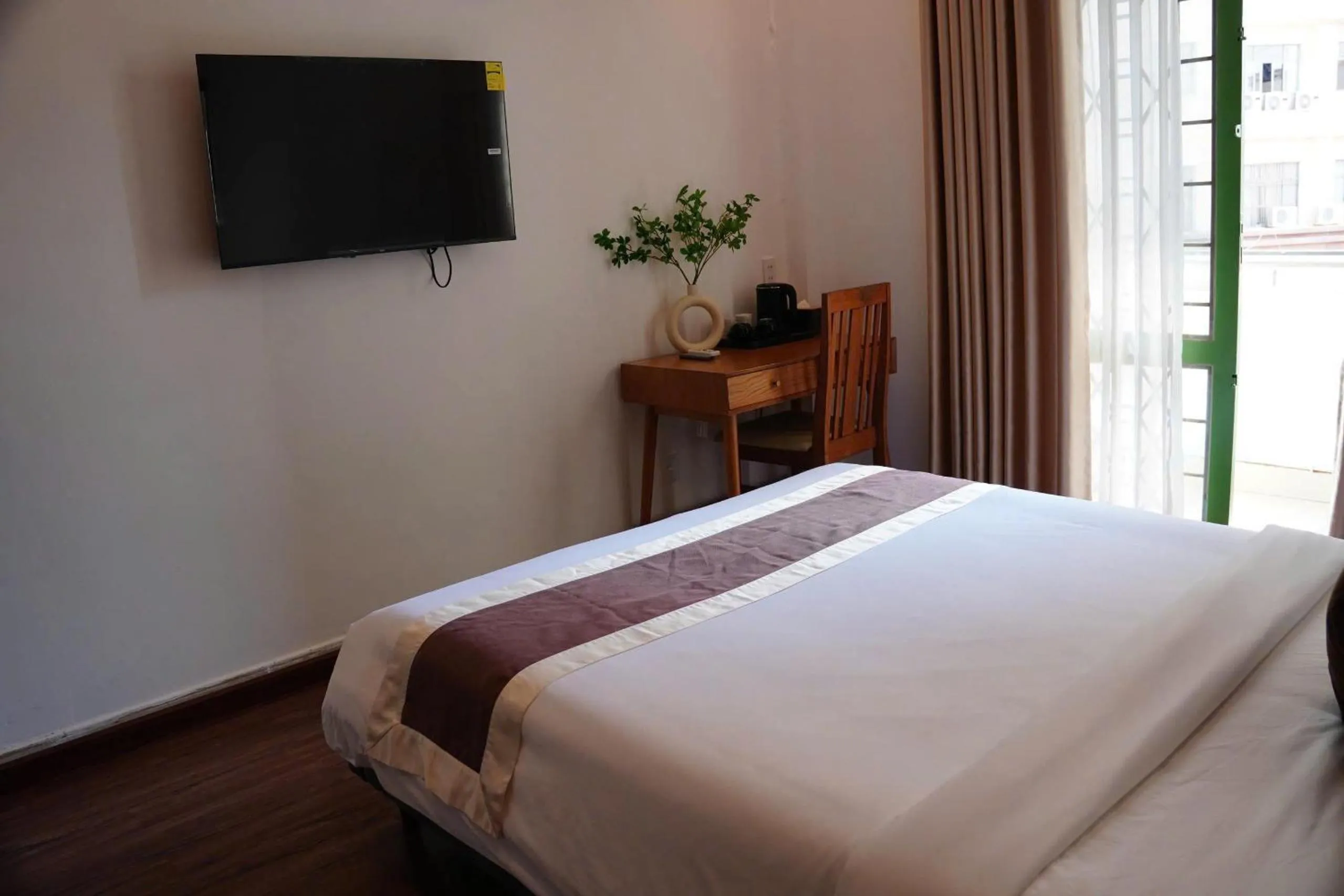 Bed in Bros Citihouse Hotel