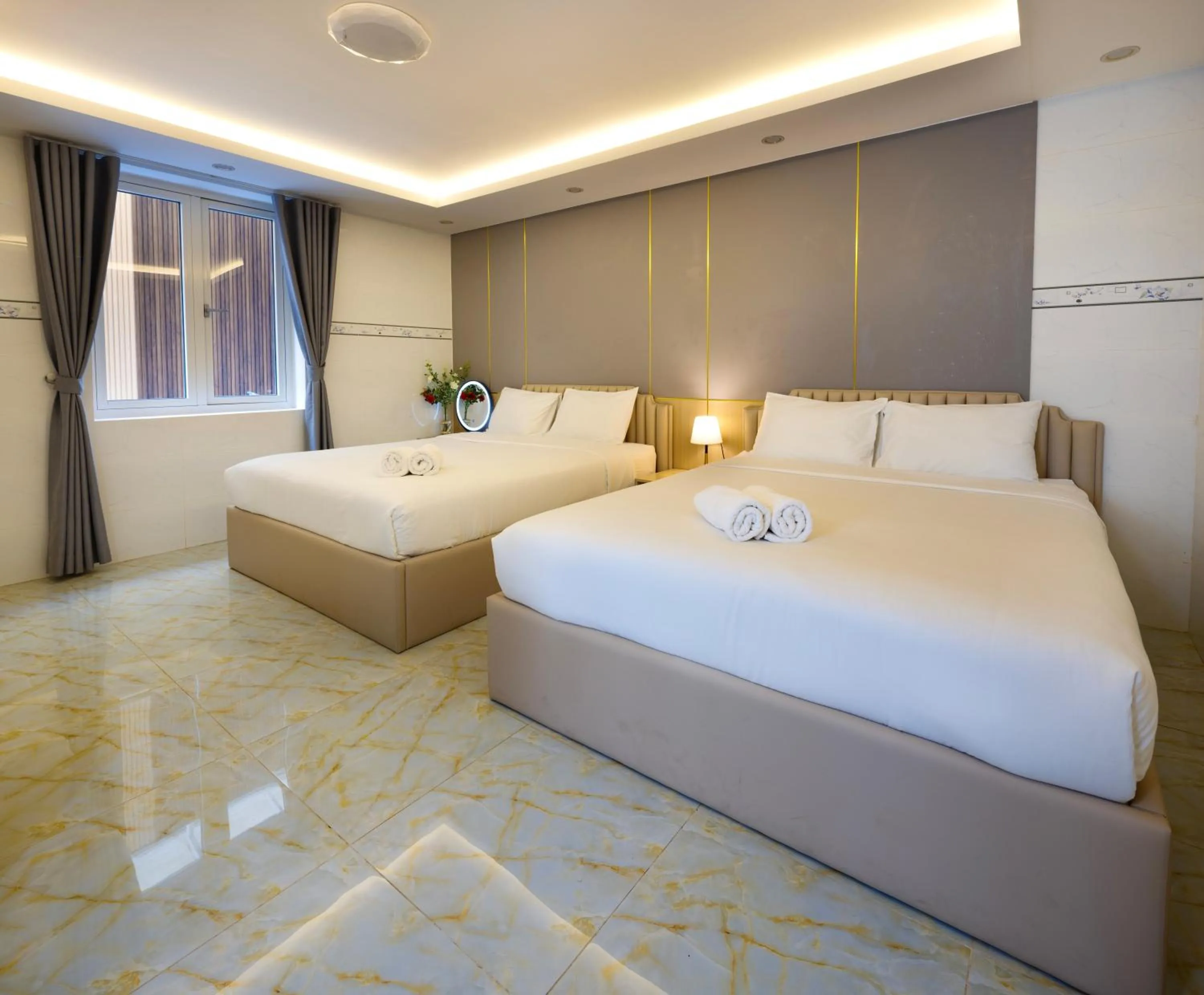 Bed in The One Da Lat Hotel