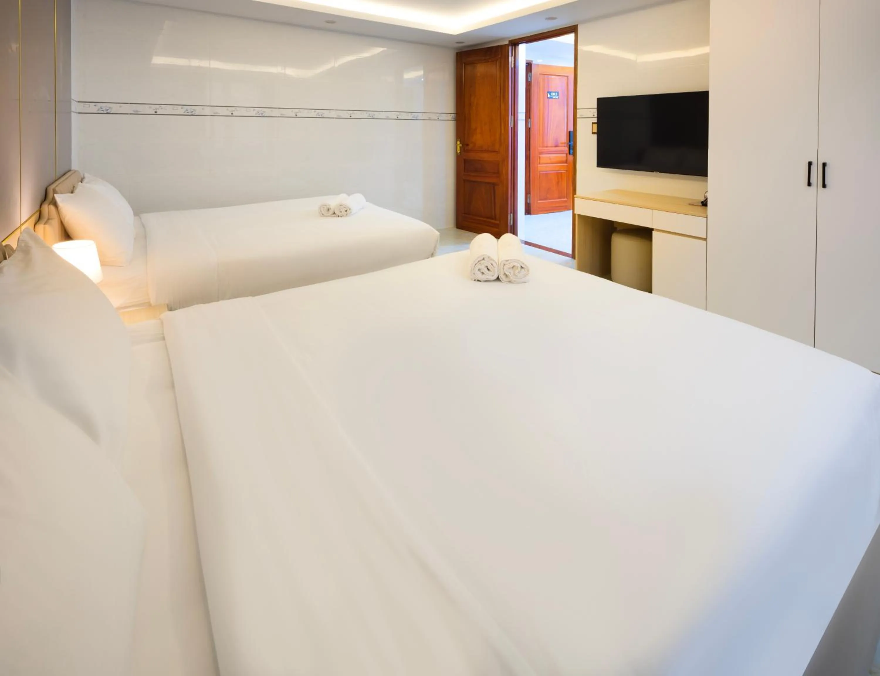 Bed in The One Da Lat Hotel