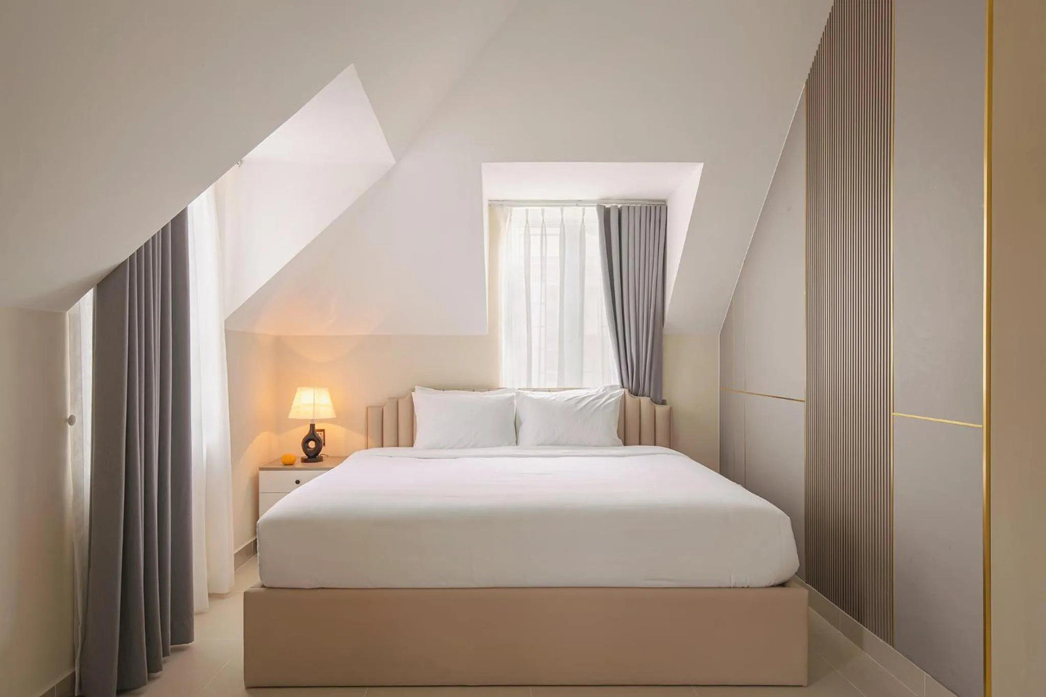 Bed in The One Da Lat Hotel